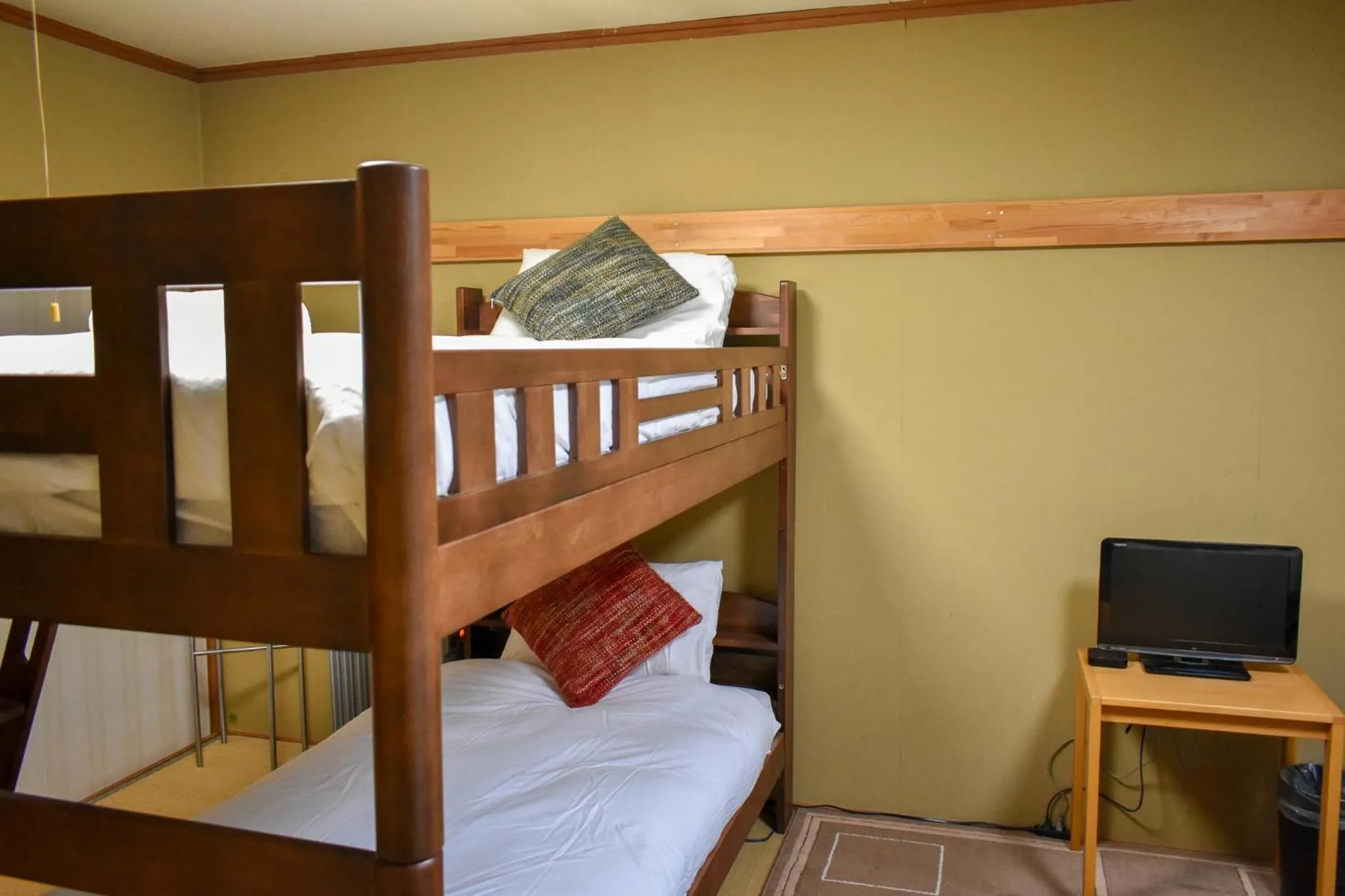 Bed in Kizuna Lodge & BBQ Centre