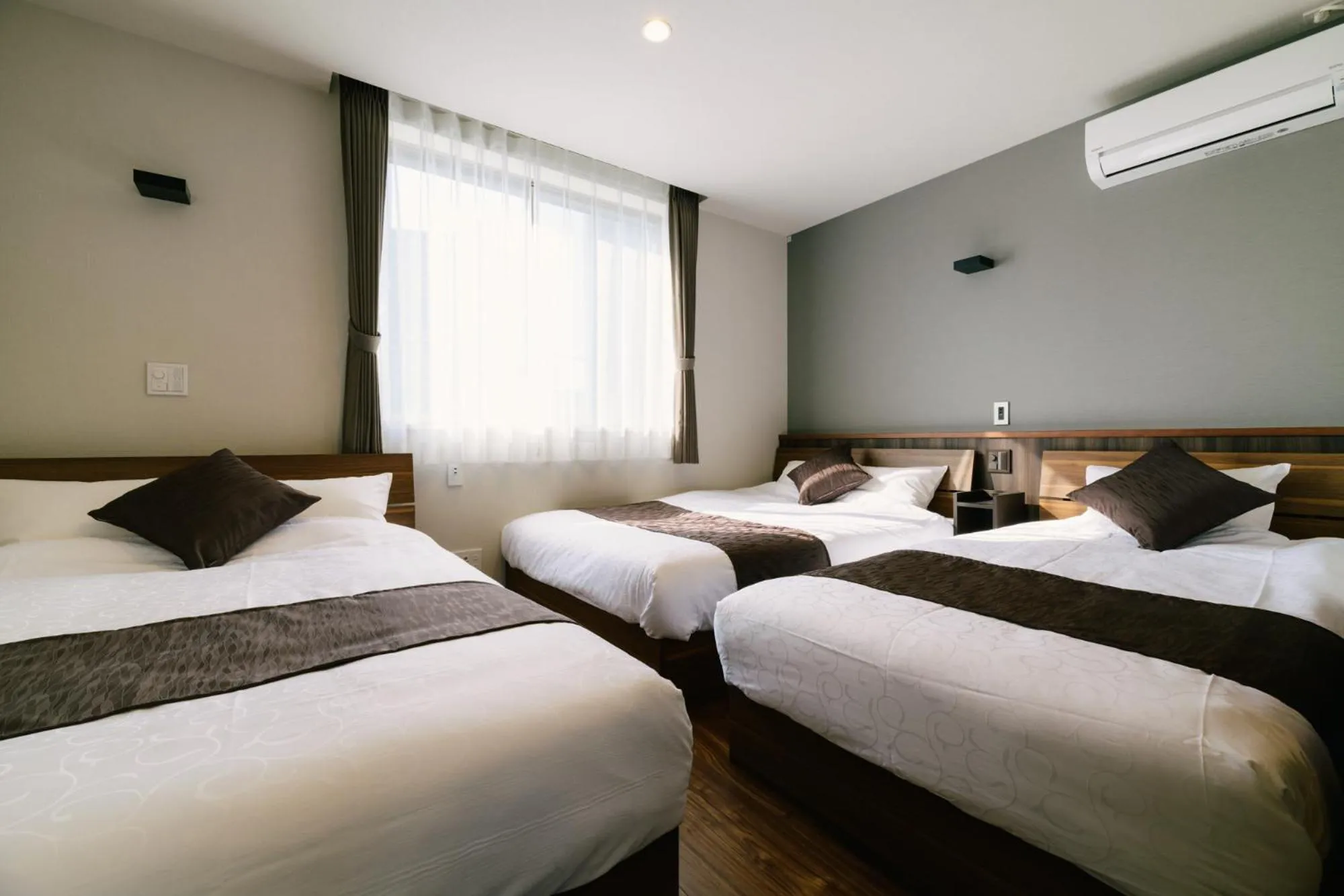 Bedroom, Bed in GRAND BASE Hakata Haruyoshi