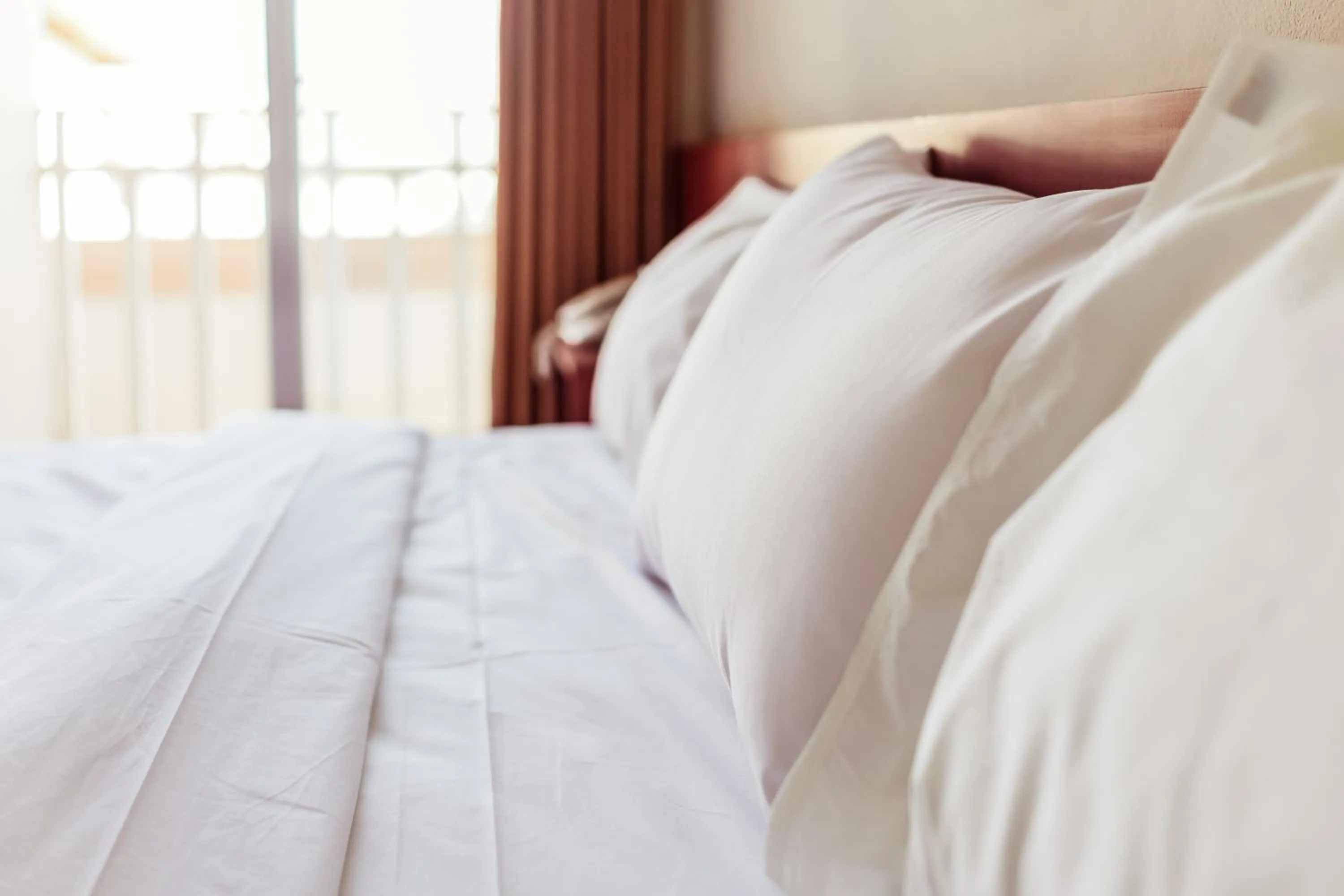 Bed in Douangpraseuth Hotel