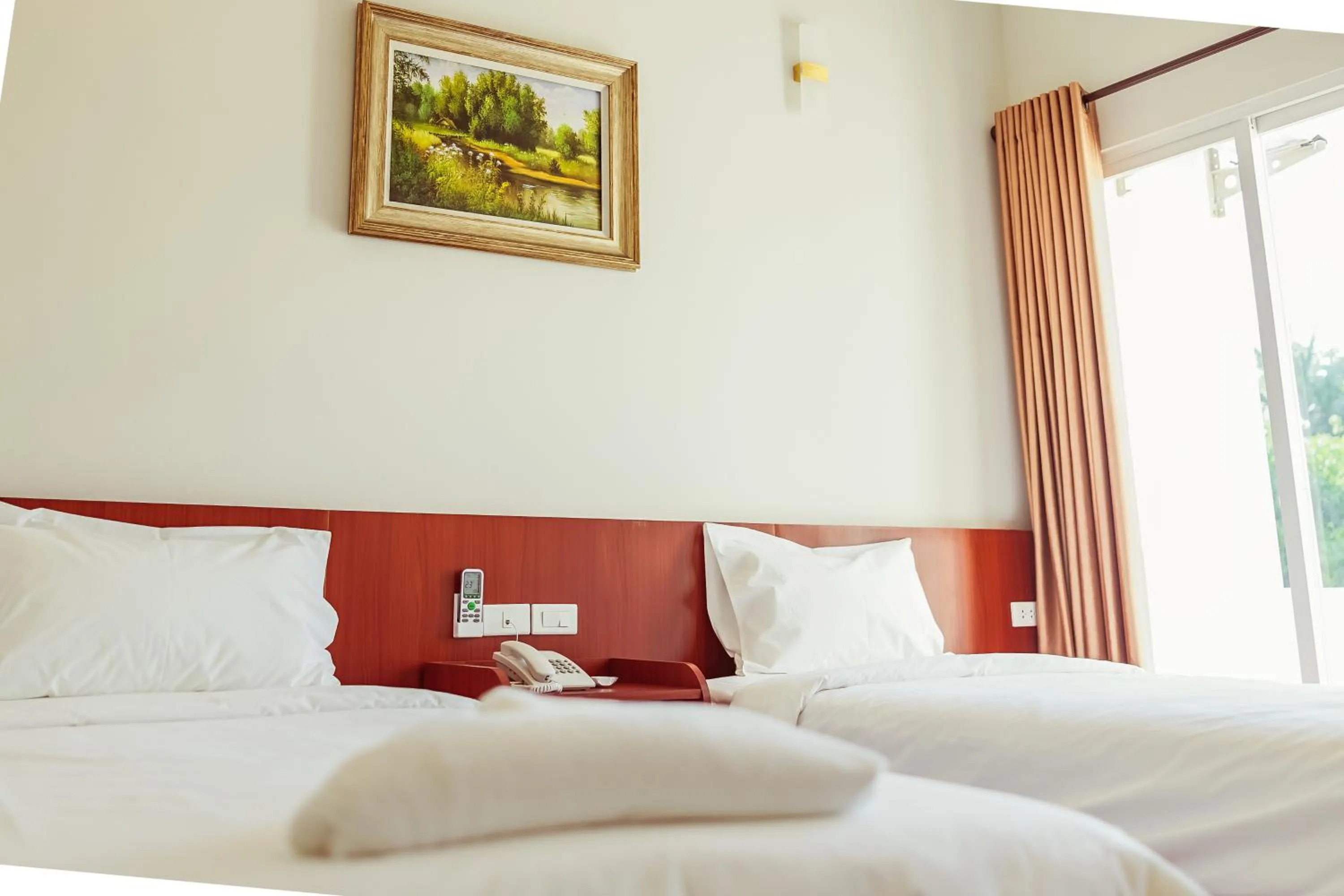 Bed in Douangpraseuth Hotel