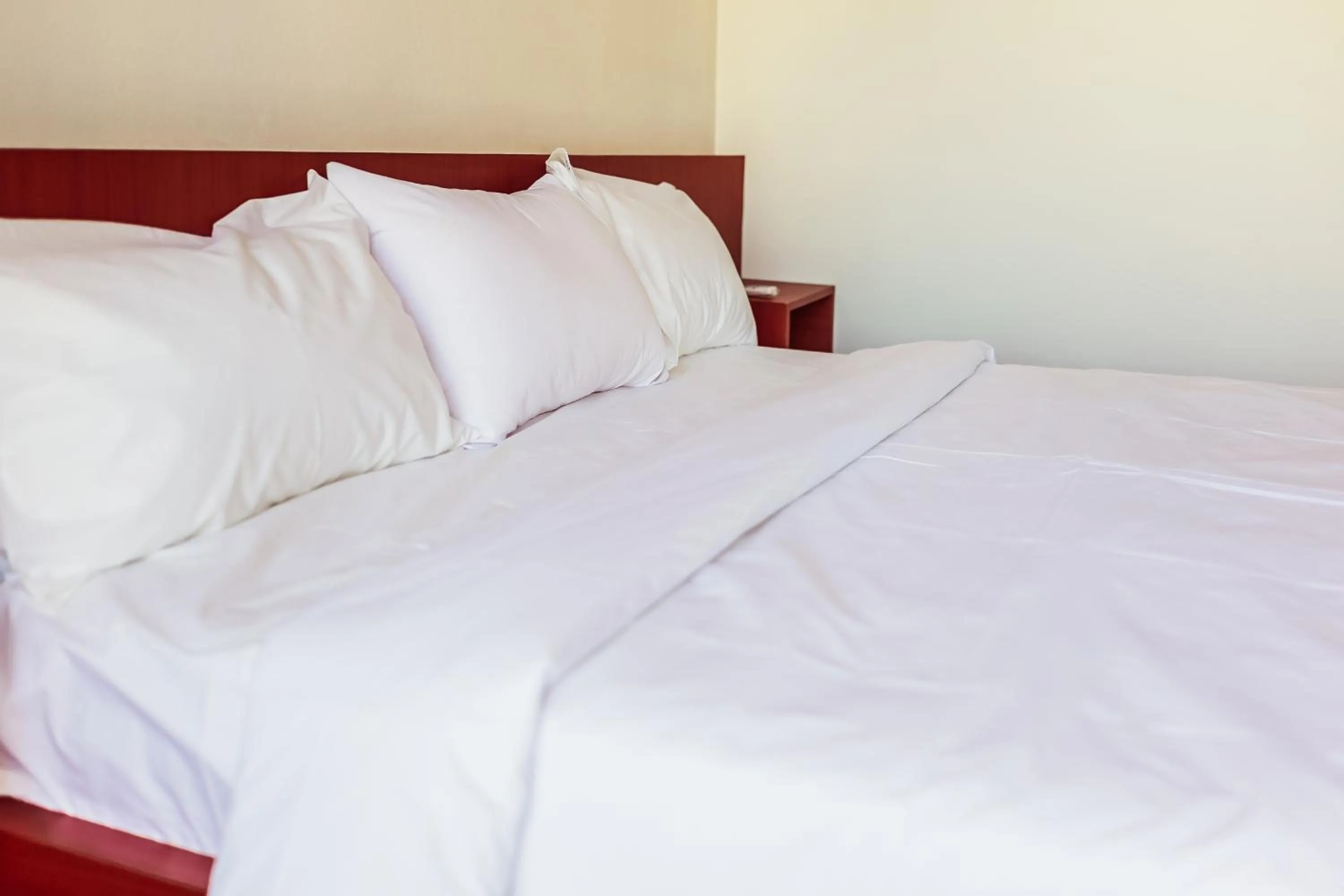 Bed in Douangpraseuth Hotel