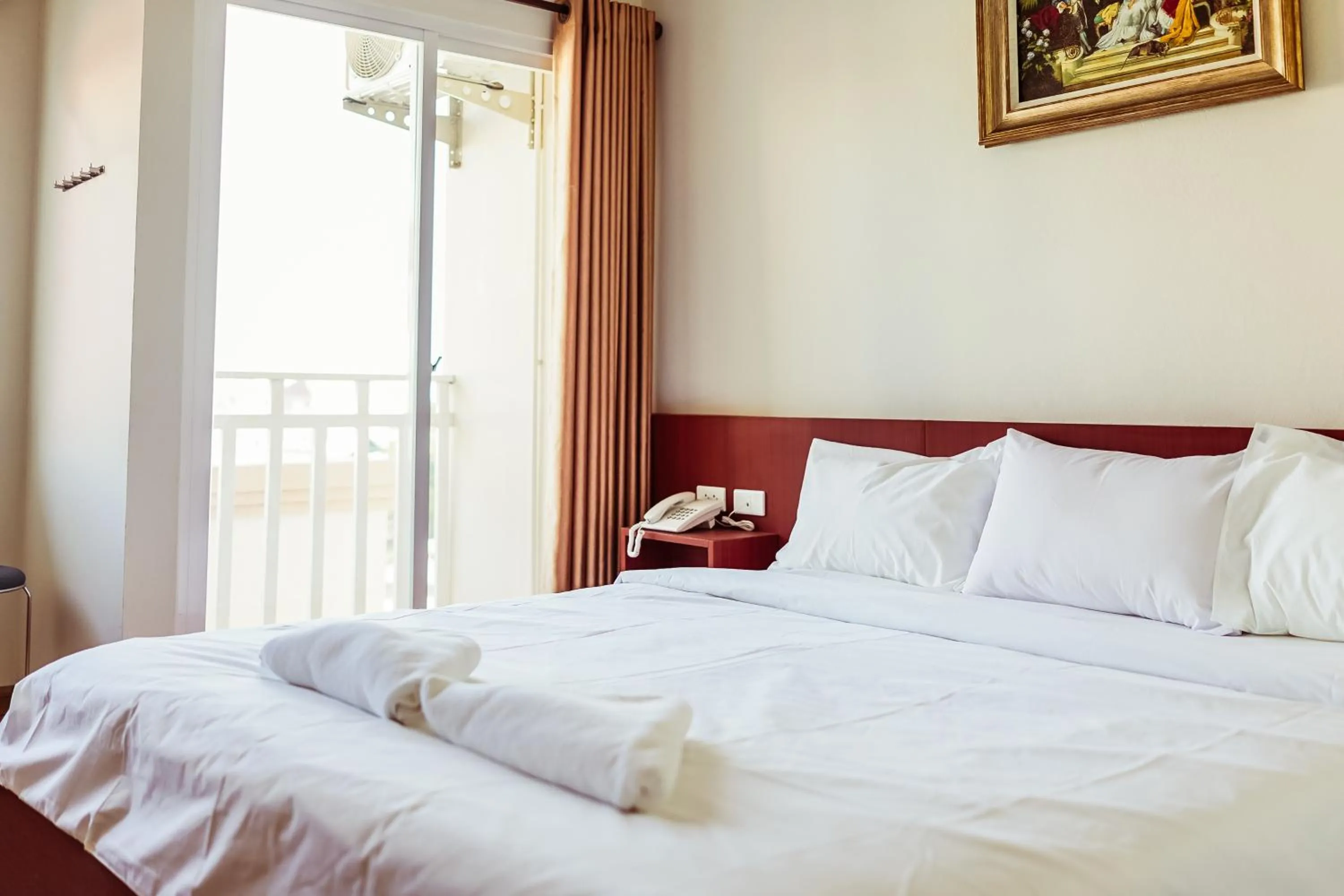 Bed in Douangpraseuth Hotel