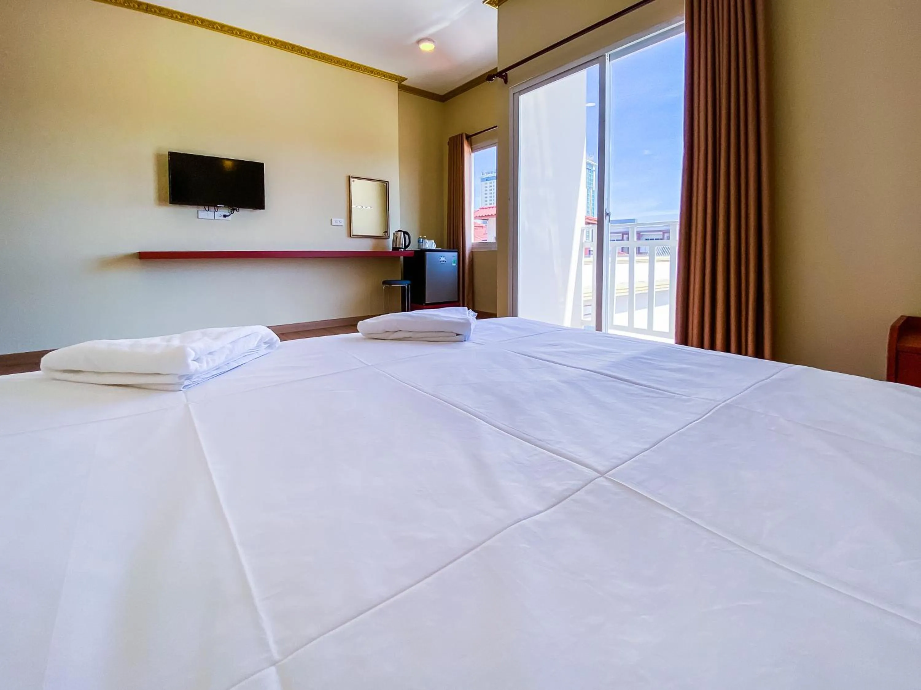 Bed in Douangpraseuth Hotel