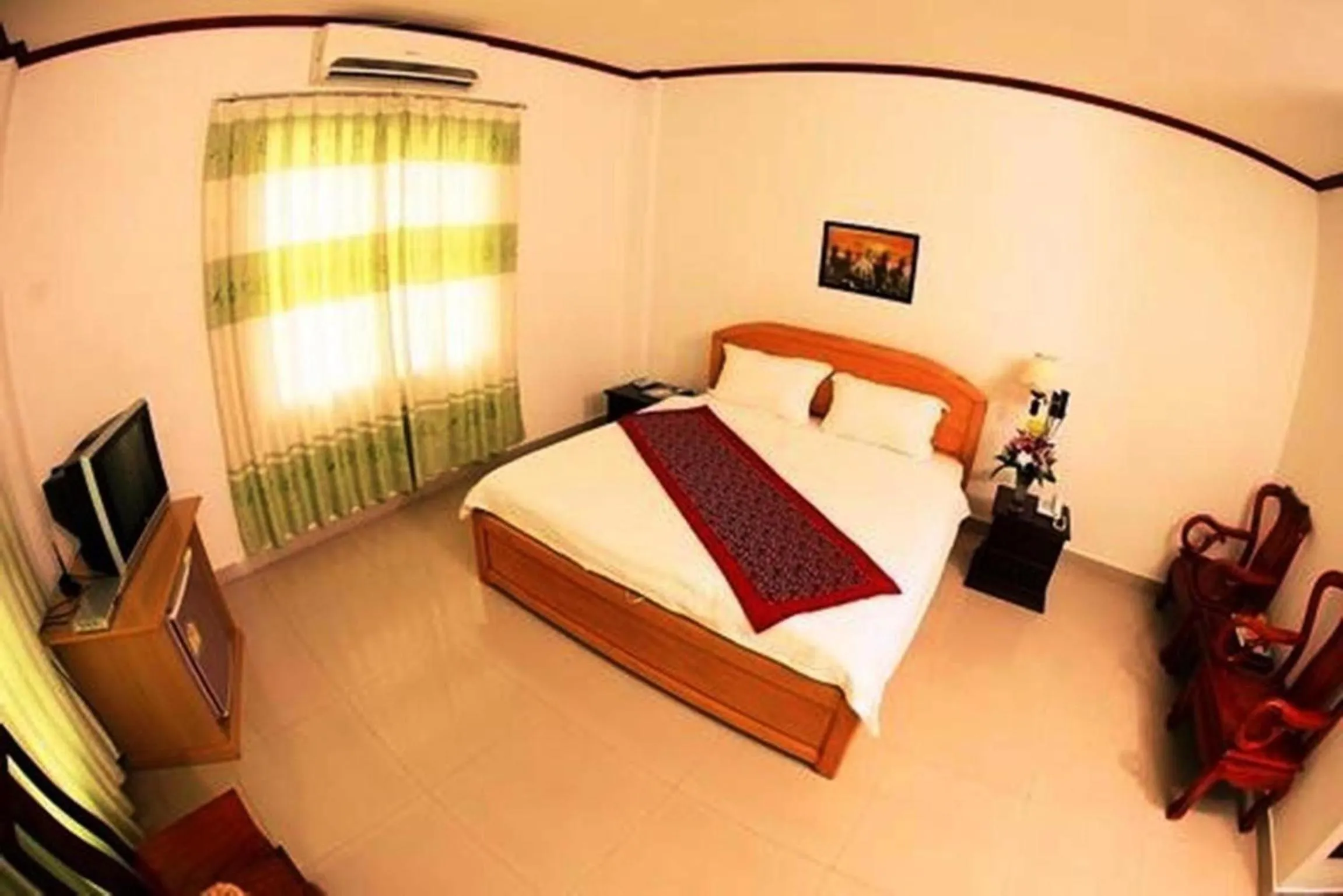Bed in Douangpraseuth Hotel