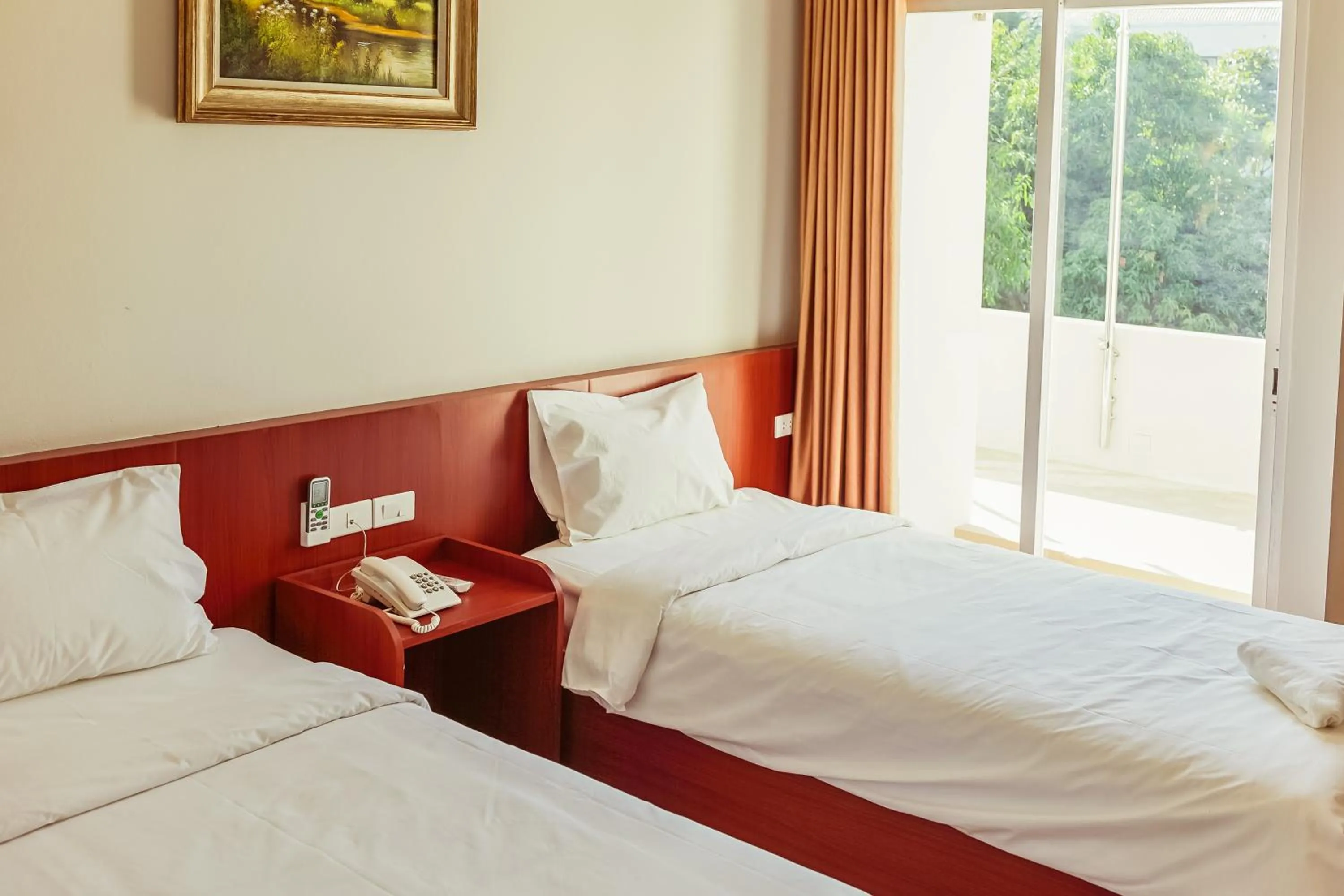 Bed in Douangpraseuth Hotel