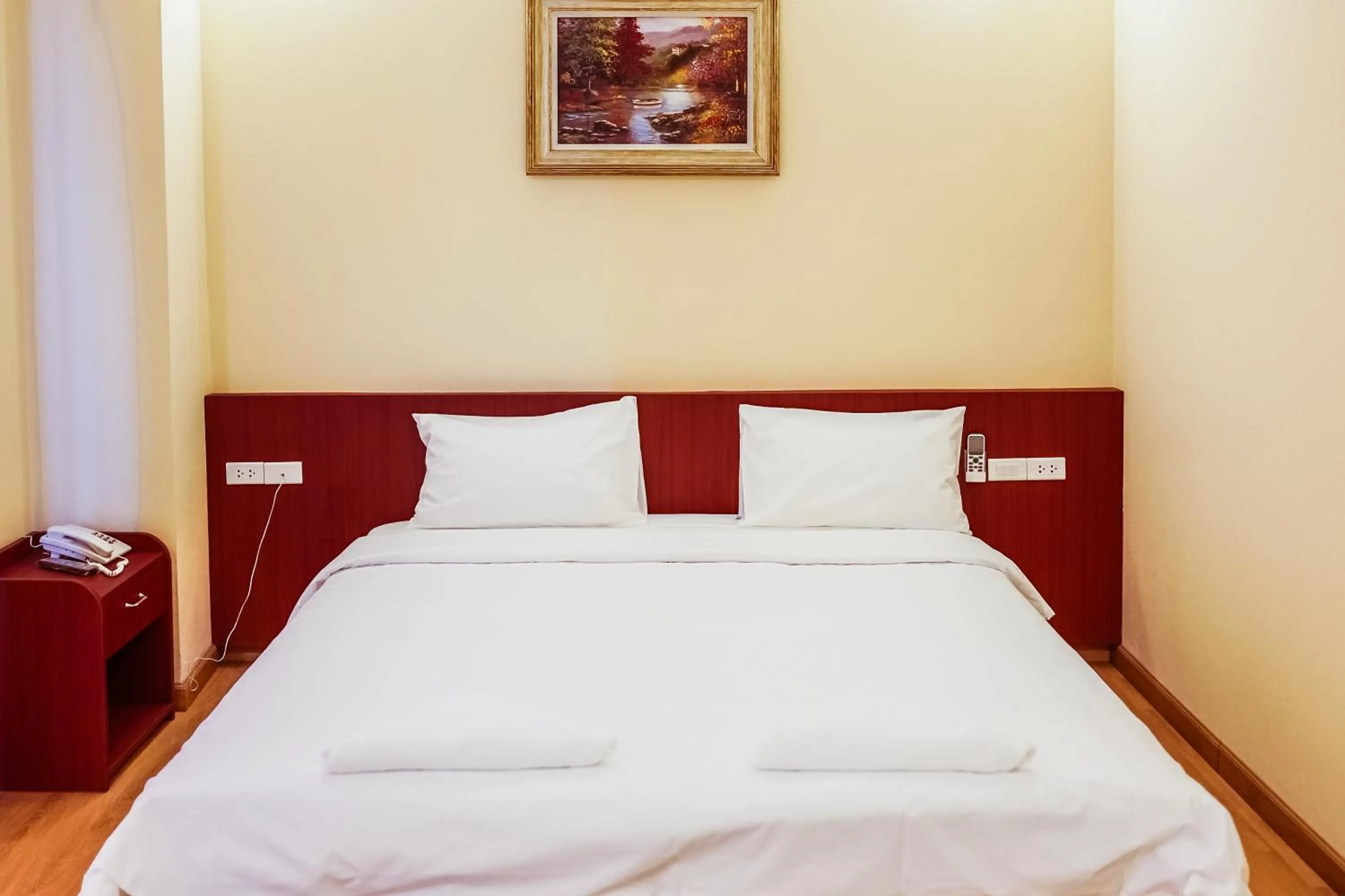 Bed in Douangpraseuth Hotel