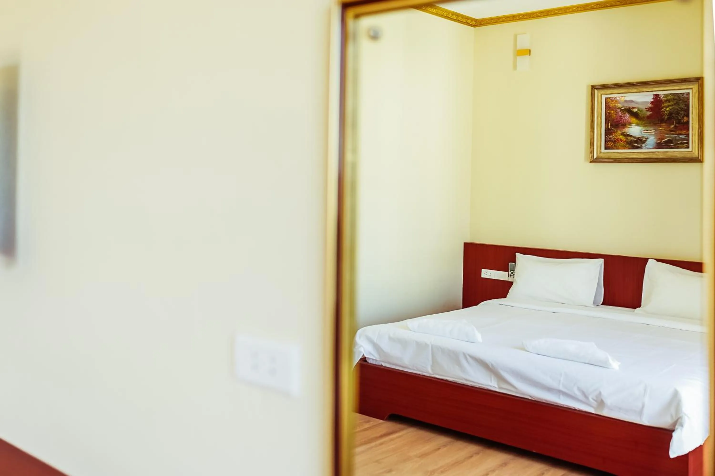 Bed in Douangpraseuth Hotel