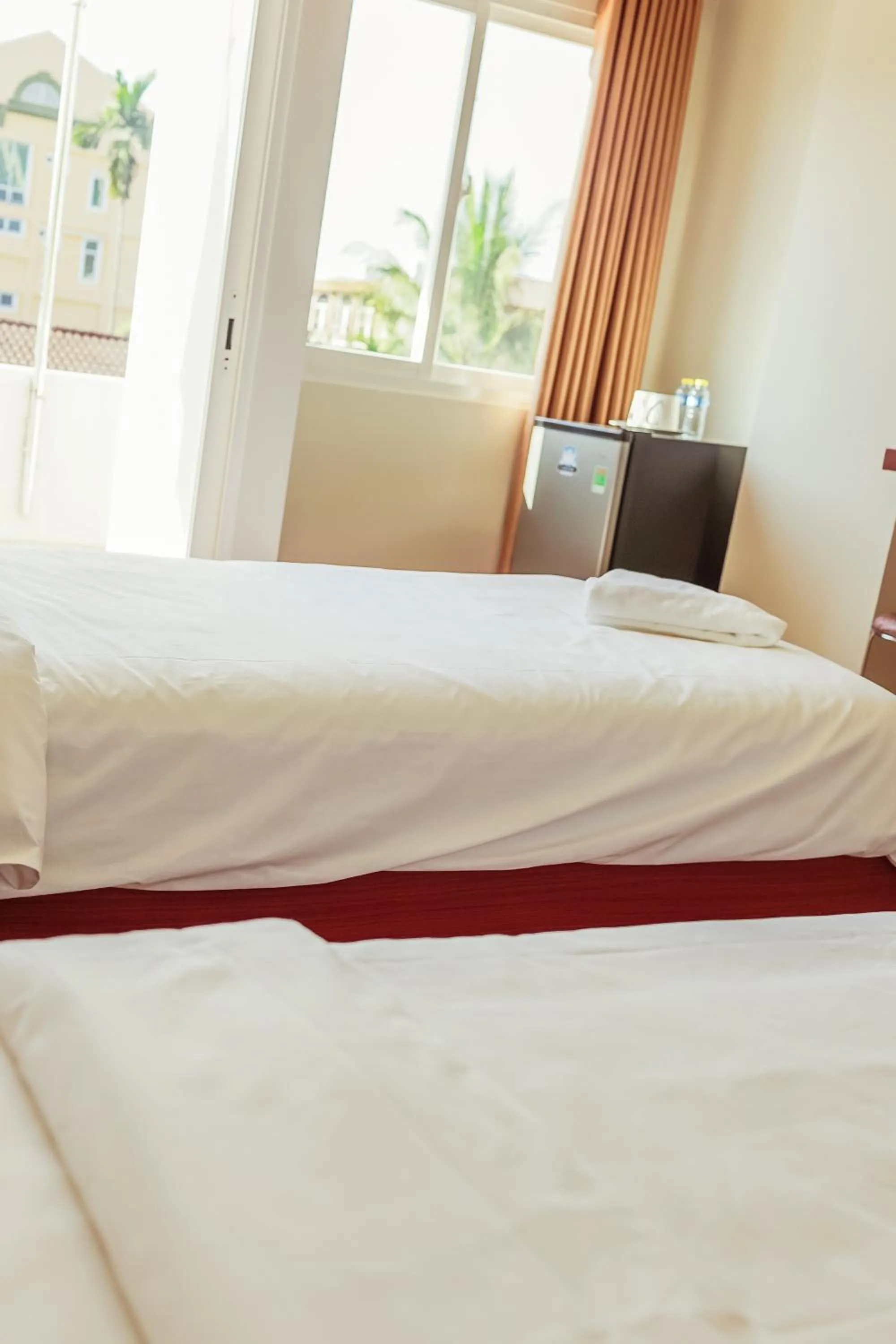 Bed in Douangpraseuth Hotel