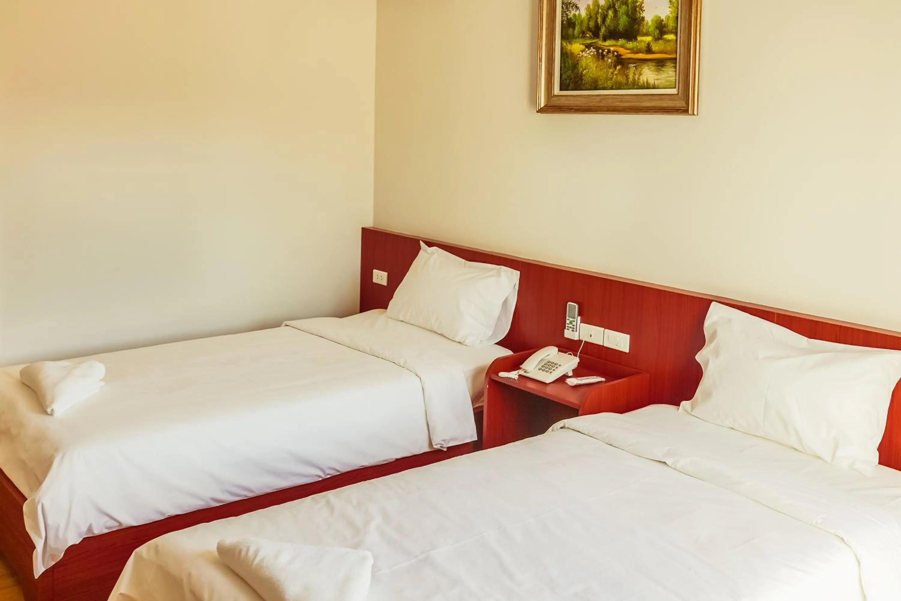 Bed in Douangpraseuth Hotel