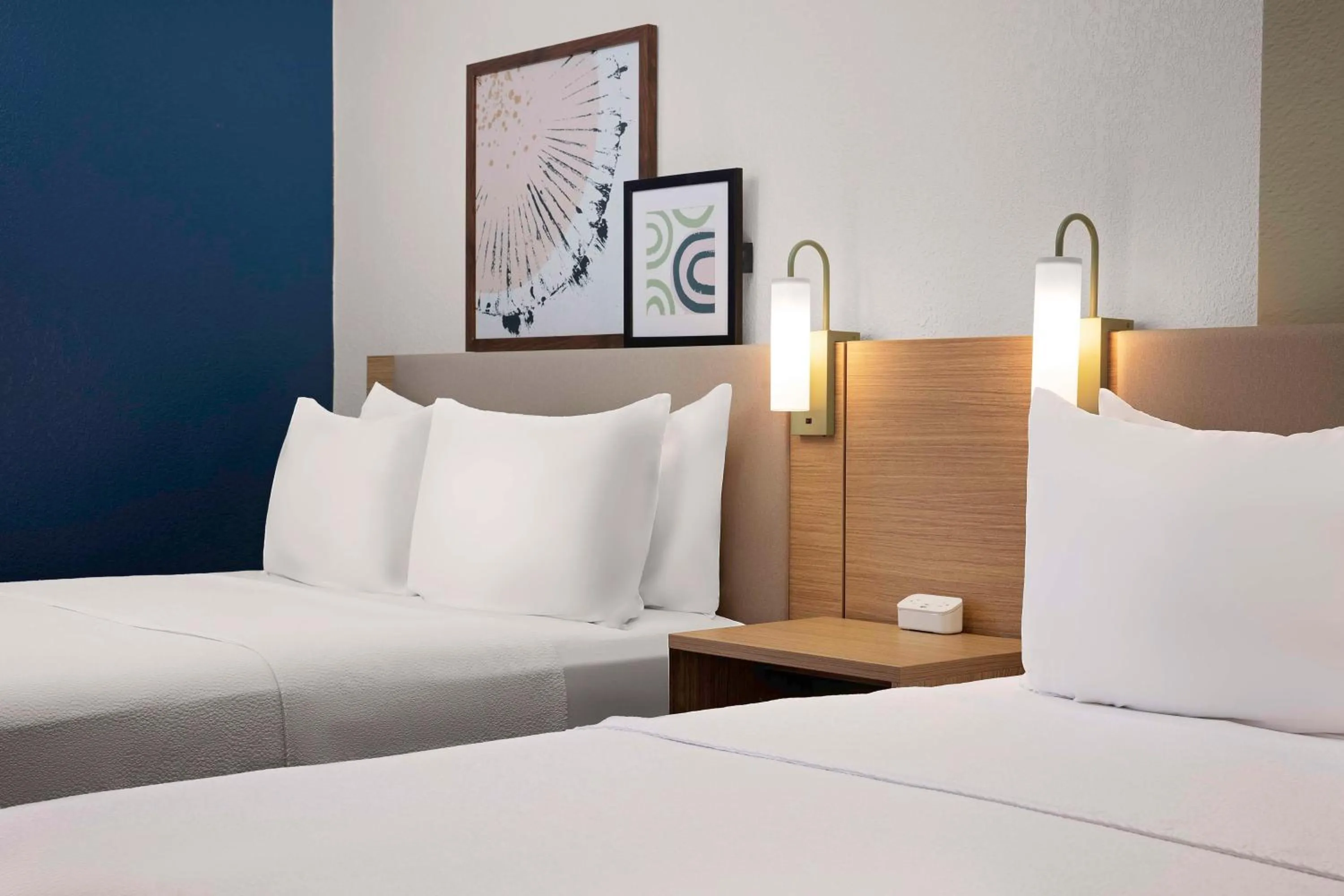 Bed in Spark by Hilton Atlanta Cumberland Ballpark