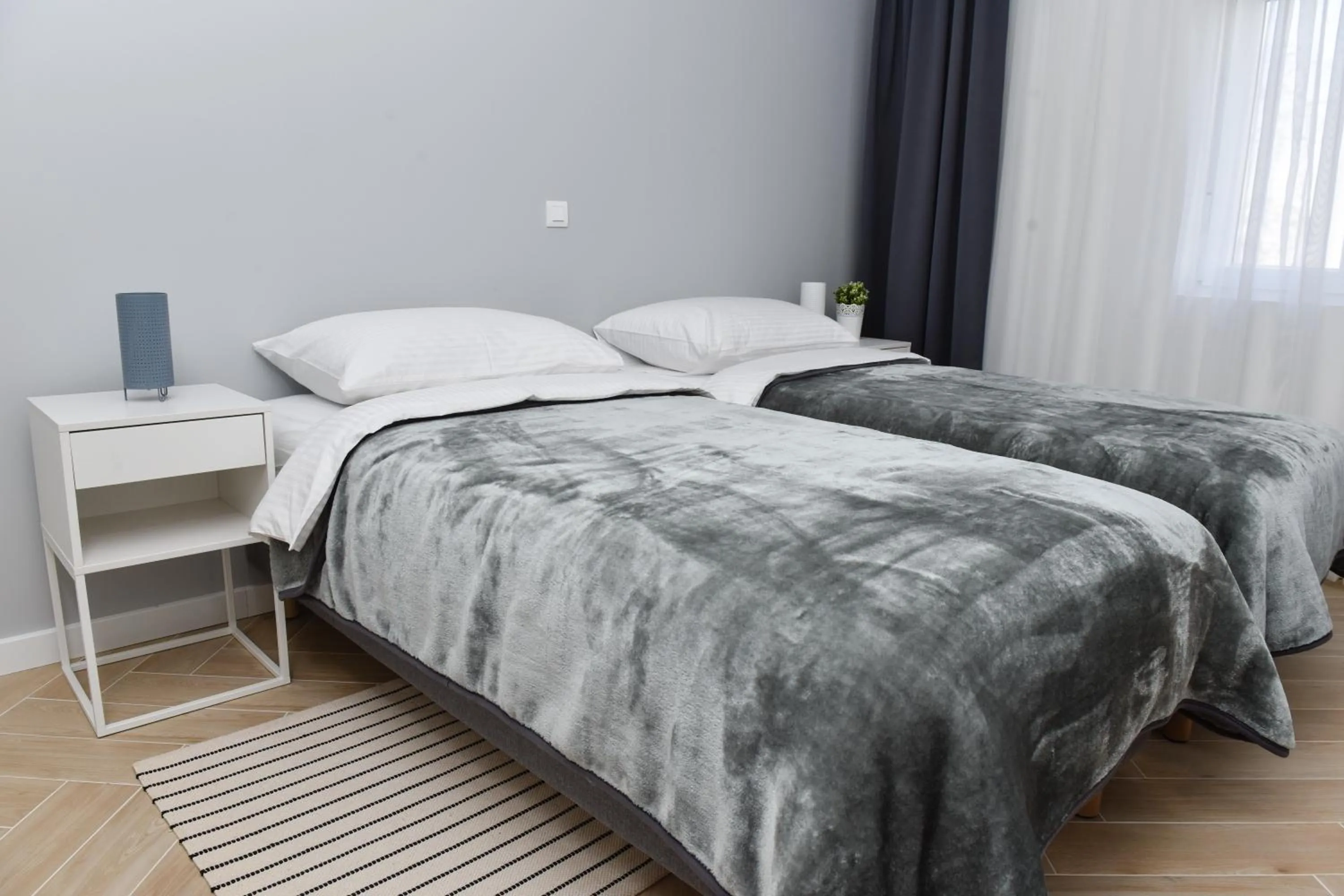 Bed in Rooms at Zajčeva 34