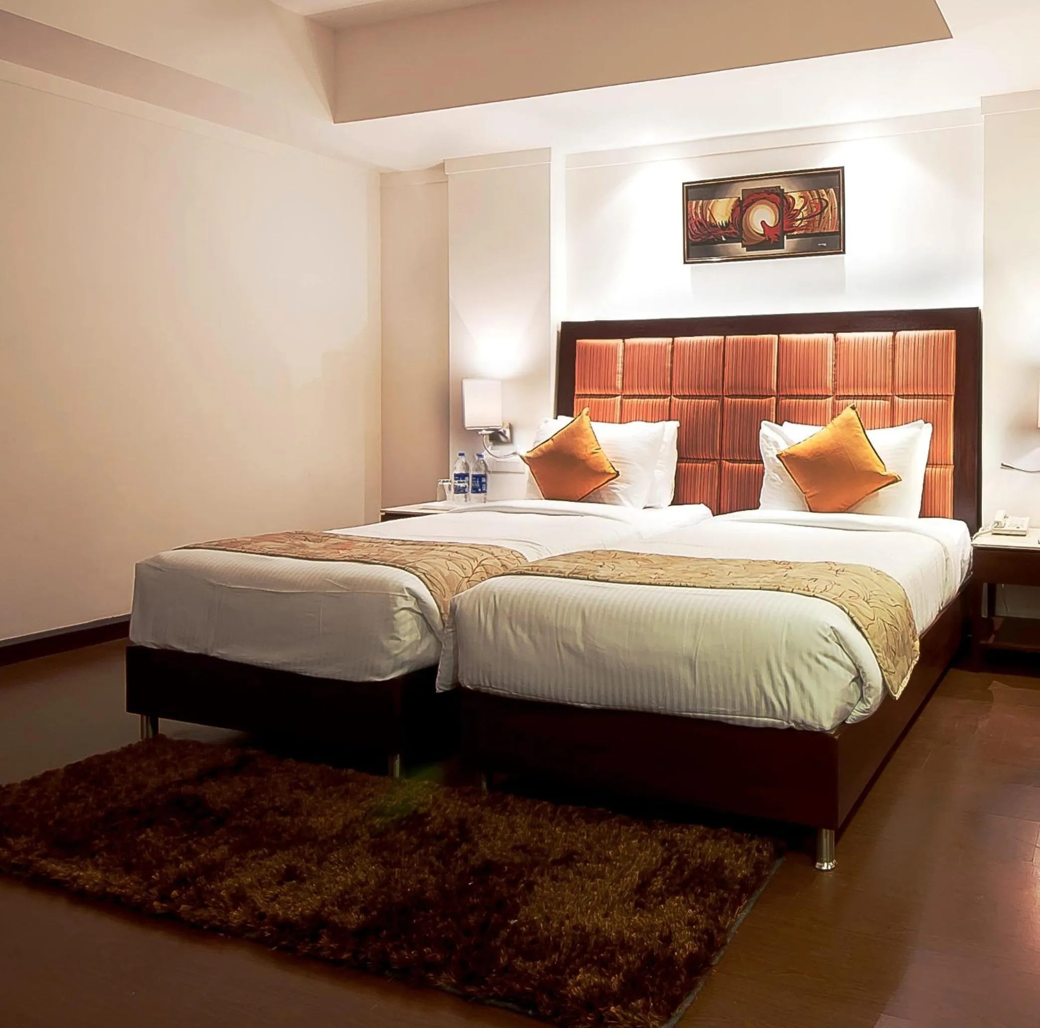 Bed in The Golden Plaza Hotel