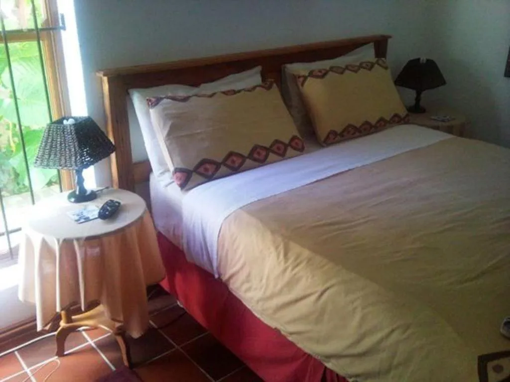 Bed in Magnolia Place Guest Houses