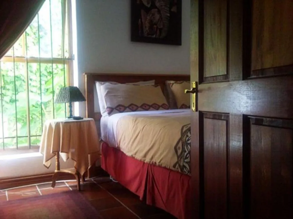 Bed in Magnolia Place Guest Houses