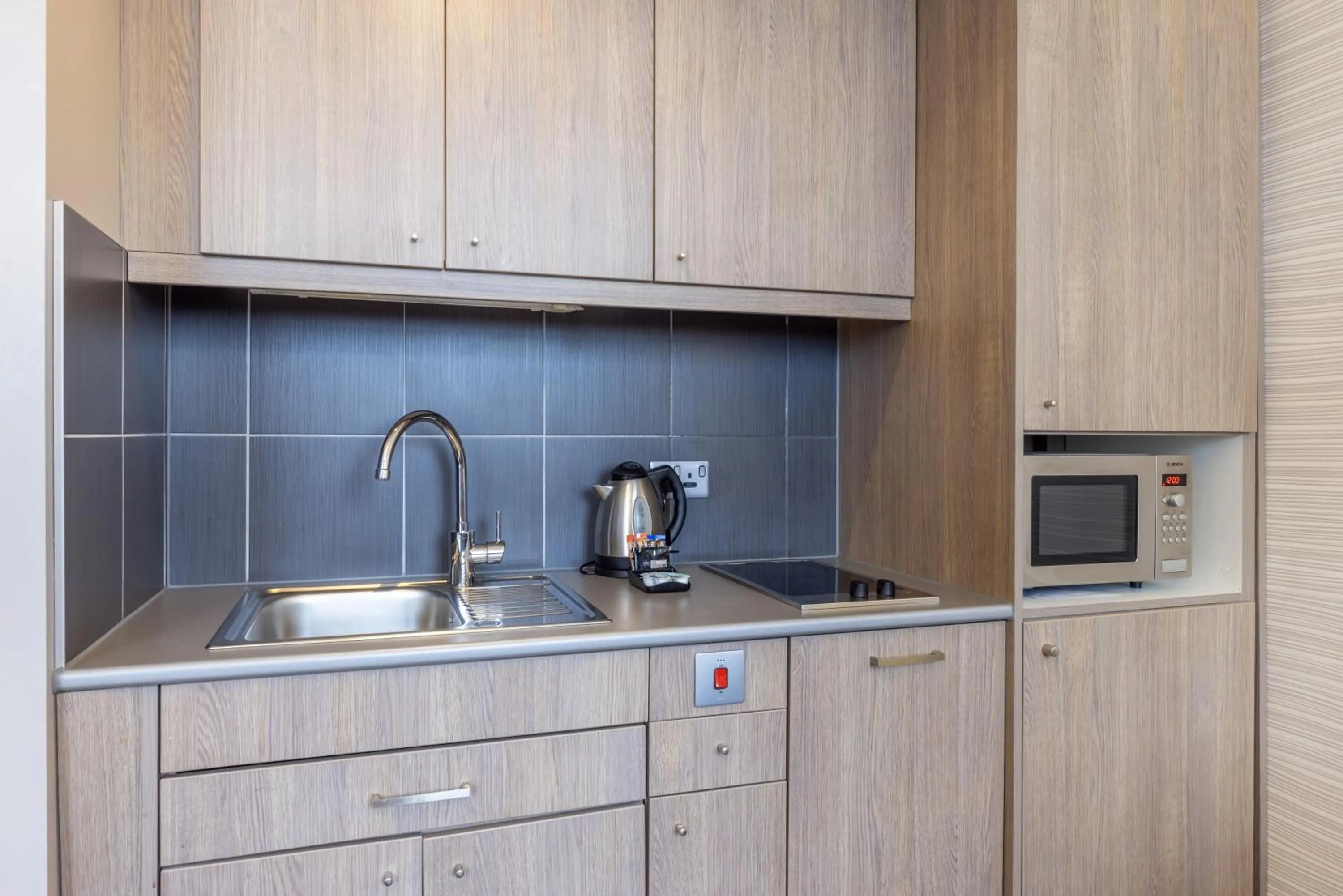 Kitchen or kitchenette in Aparthotel Adagio Liverpool City Centre