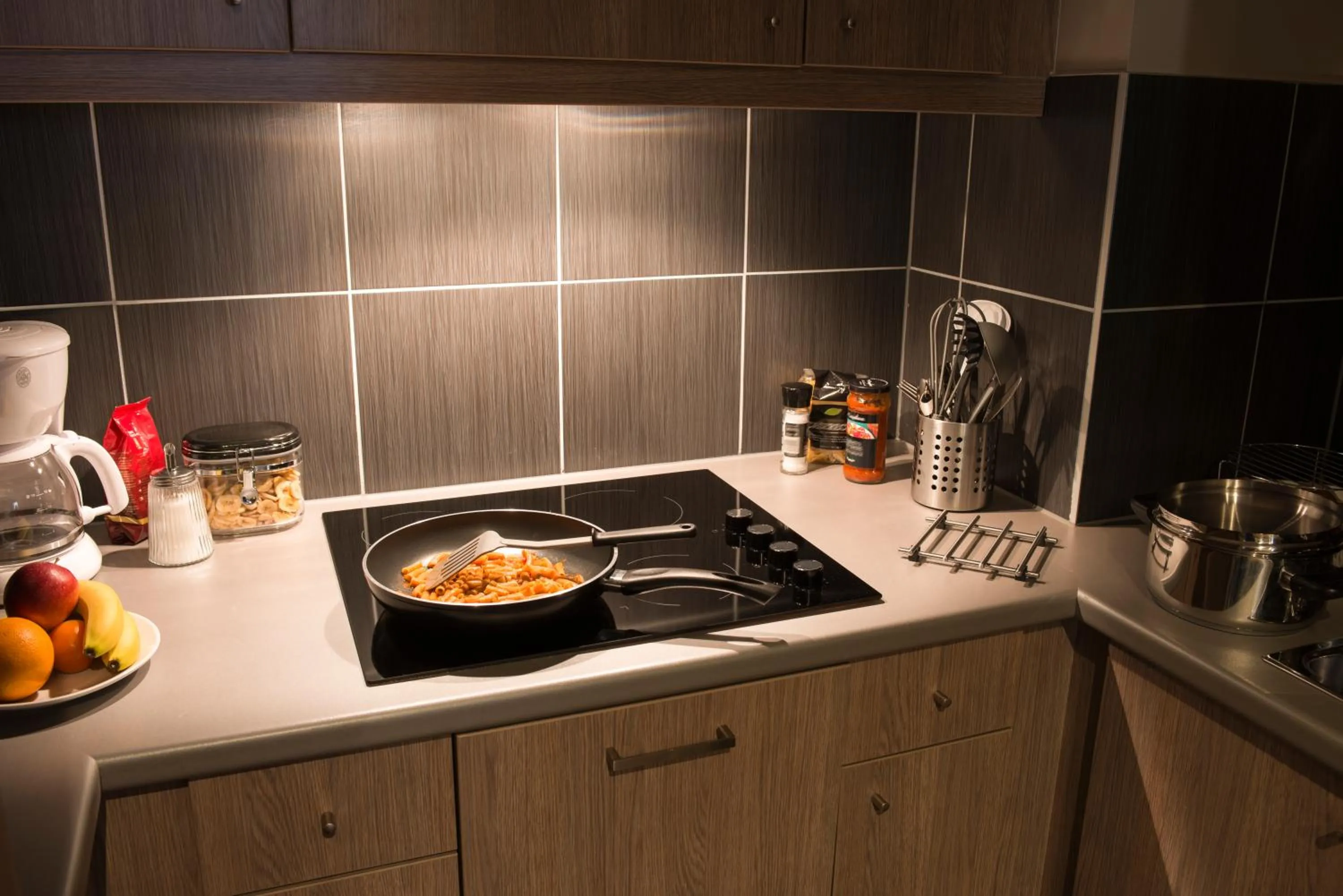 Kitchen or kitchenette in Aparthotel Adagio Liverpool City Centre