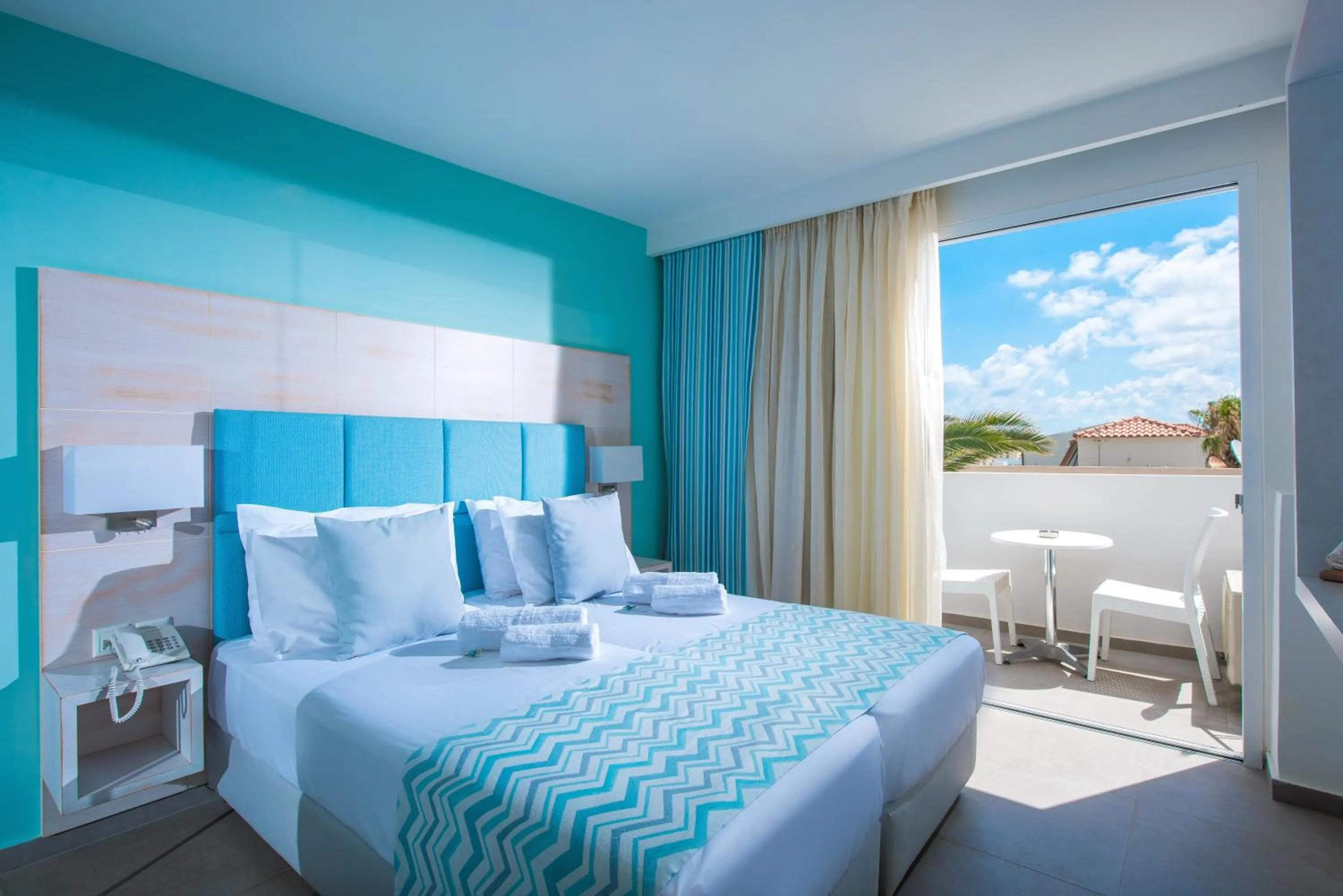 Bed in Odyssia Beach Hotel