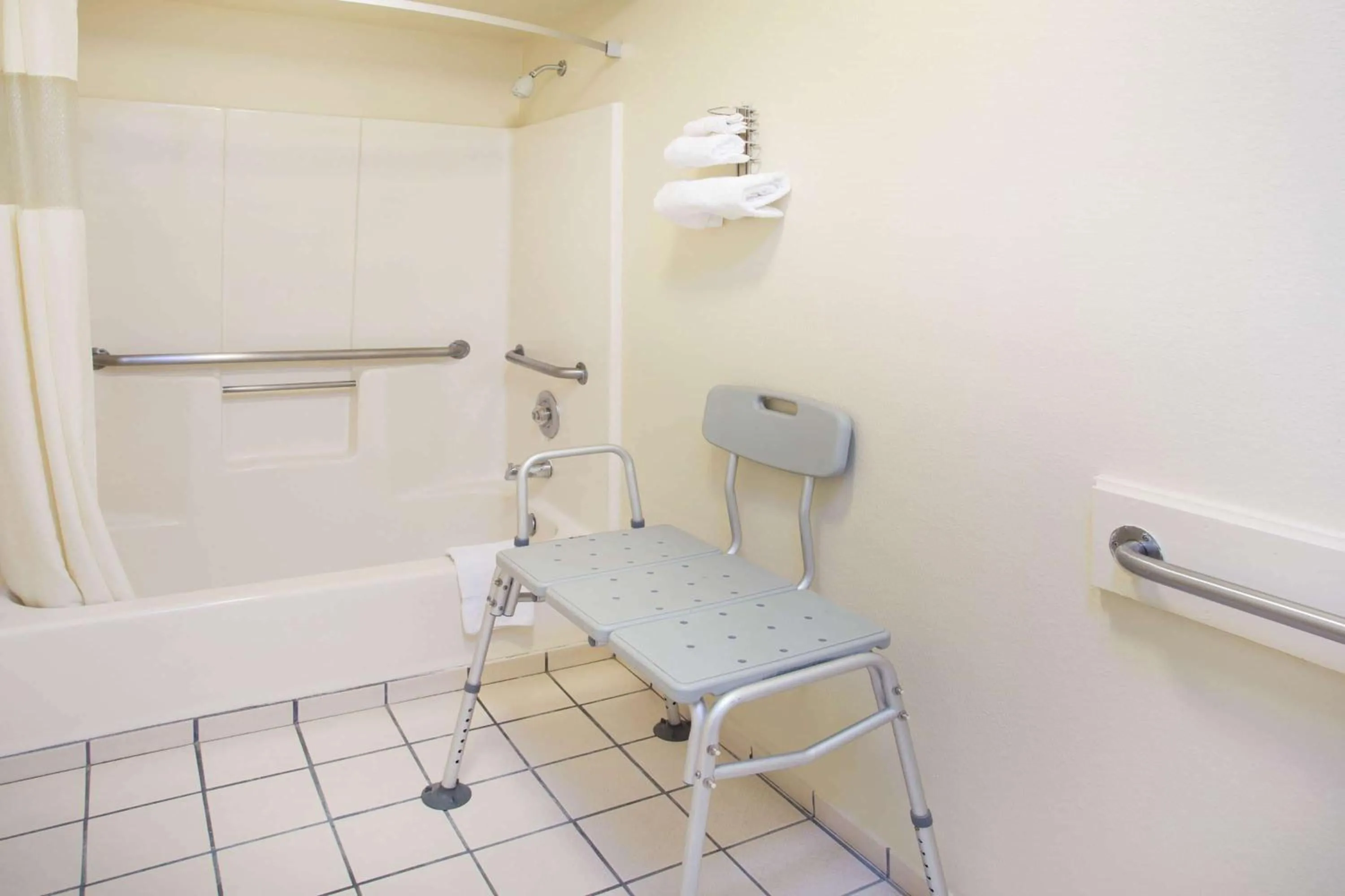 Bathroom in Travelodge by Wyndham Indio