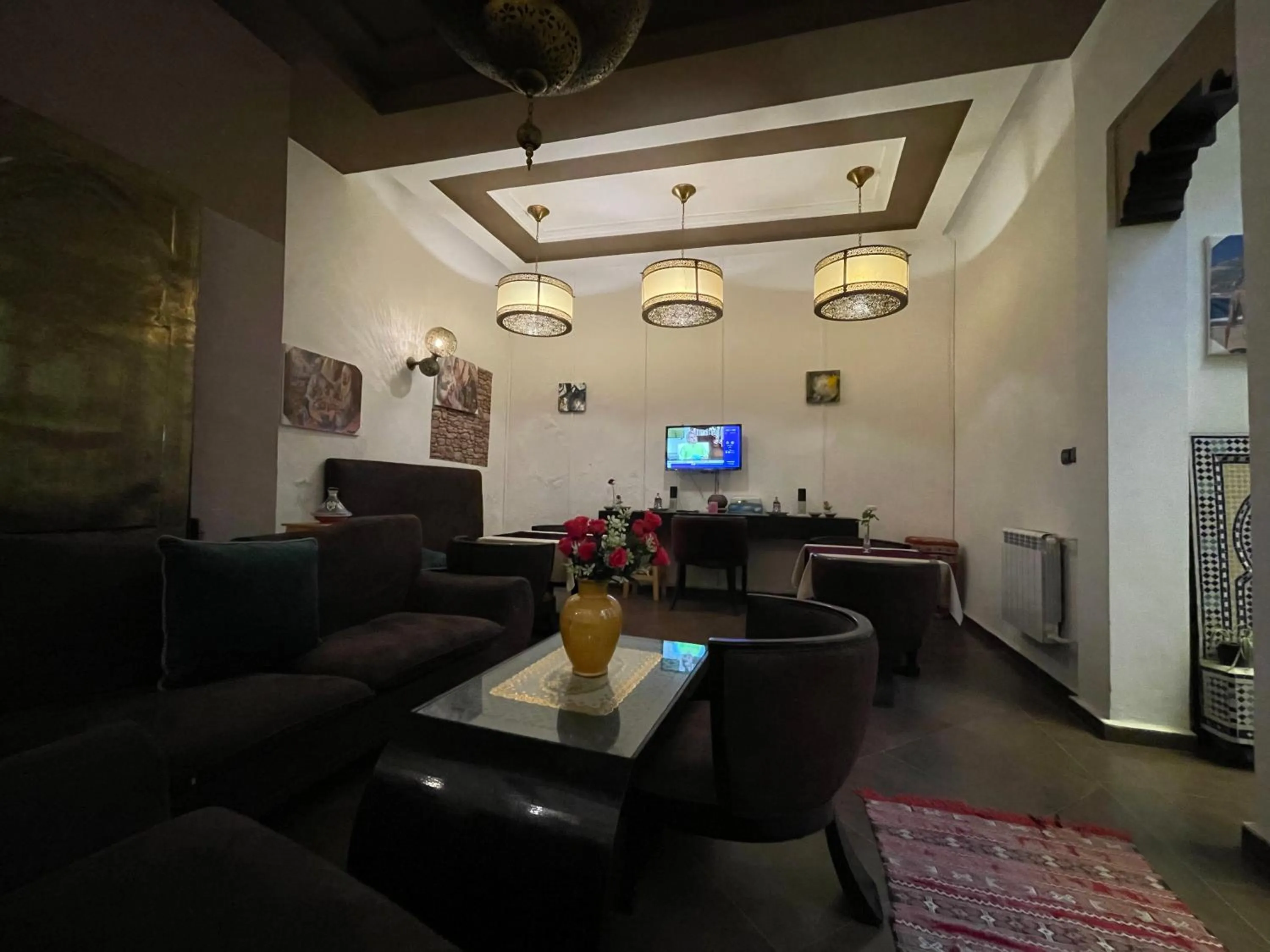 Communal lounge/ TV room in Riad 7 Pierres