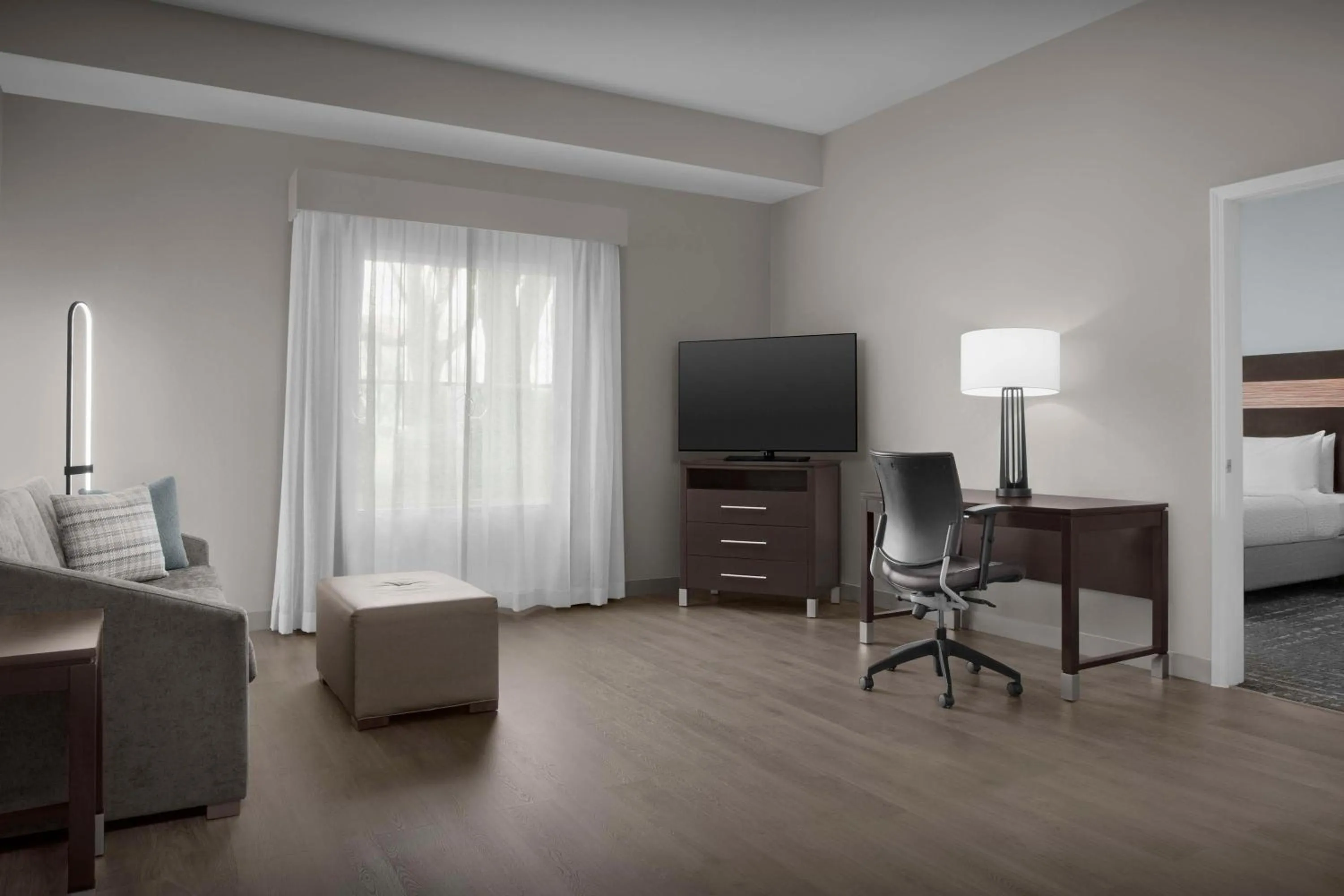 Bed in Homewood Suites by Hilton Orlando Airport