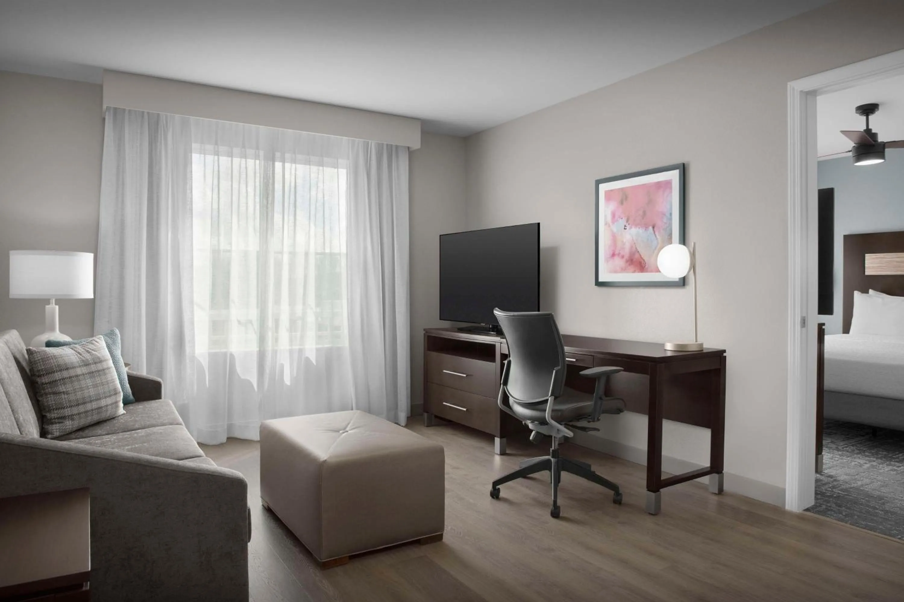 Bed in Homewood Suites by Hilton Orlando Airport