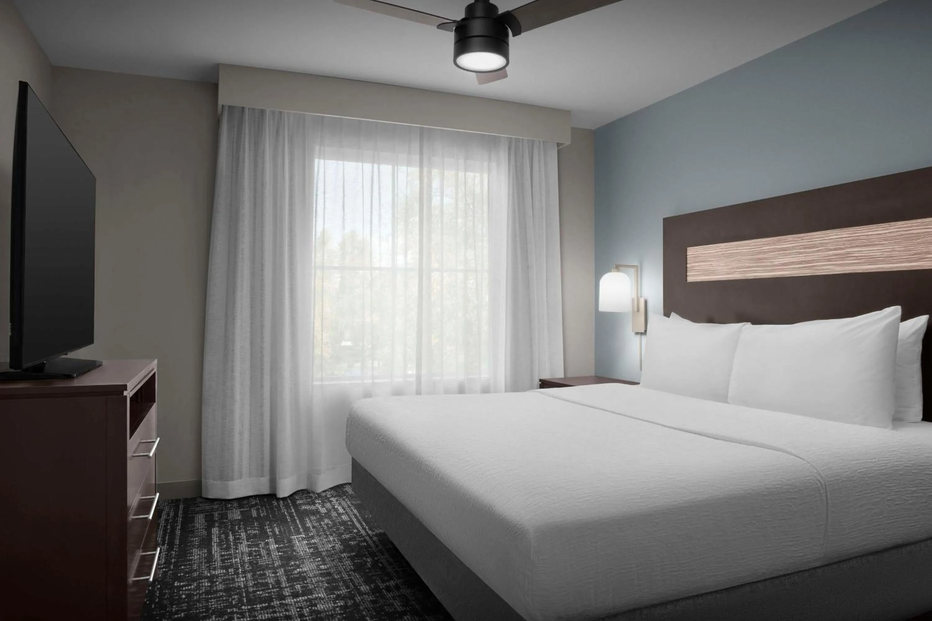 Bed in Homewood Suites by Hilton Orlando Airport