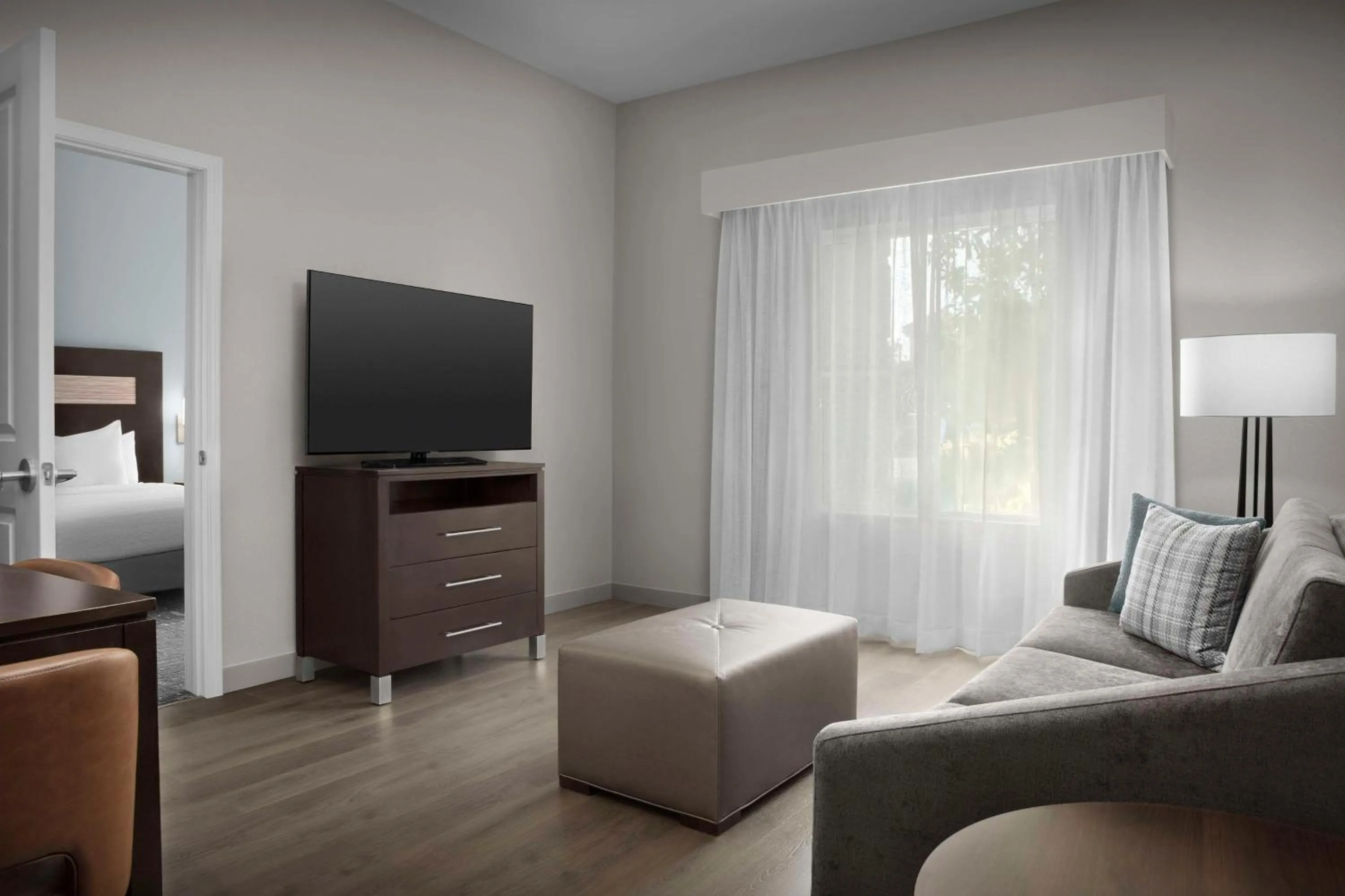 Bed in Homewood Suites by Hilton Orlando Airport