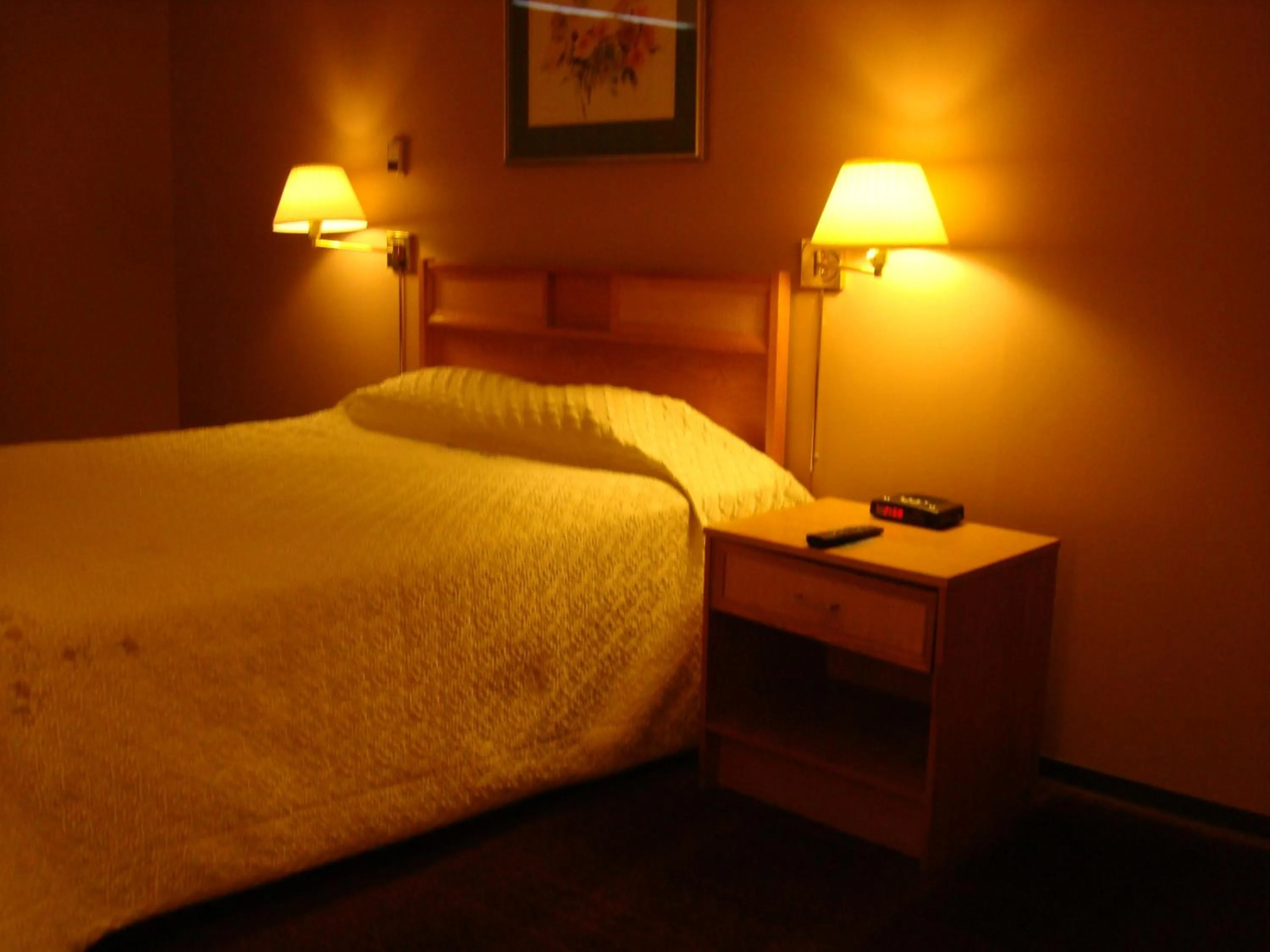 Bed in Blue Bird Hotel