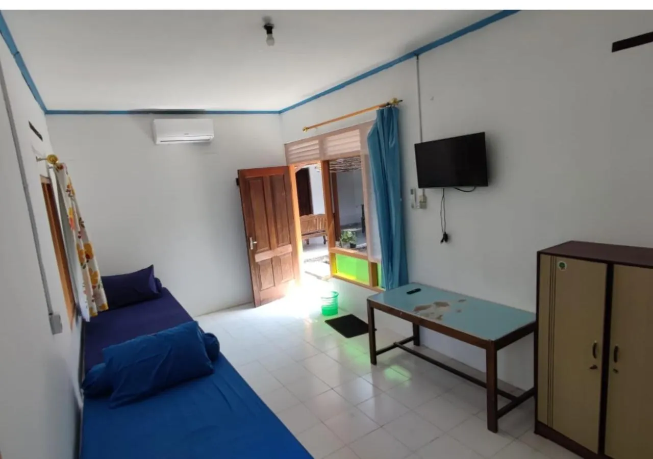 TV and multimedia, Bed in Genthong Homestay