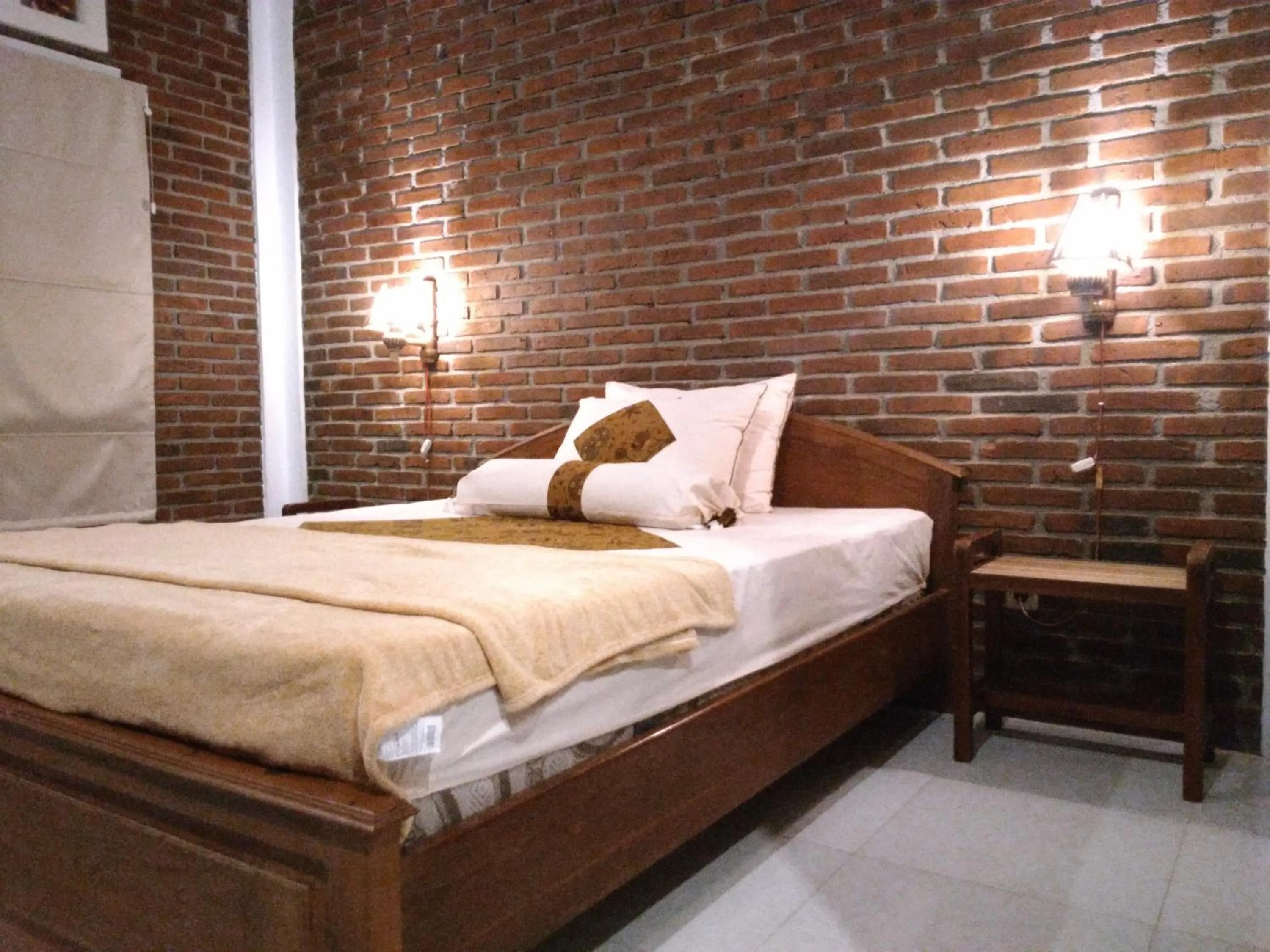 Bed in Genthong Homestay