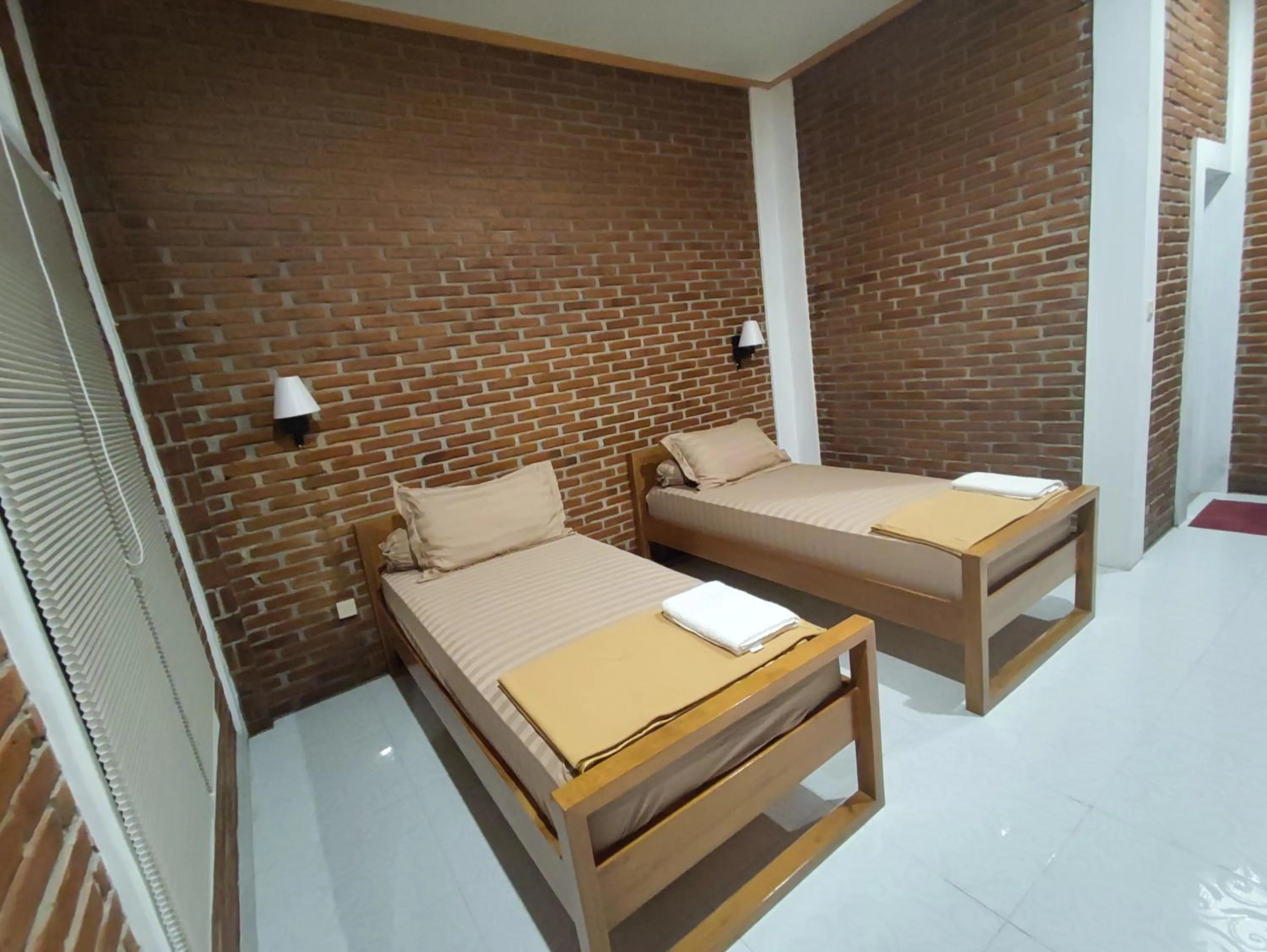 Bed in Genthong Homestay