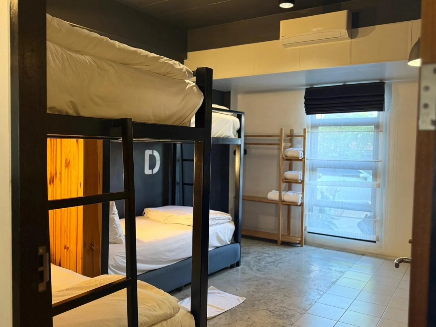 Photo of the whole room, Bed in Blu Monkey Hotel Surat Thani