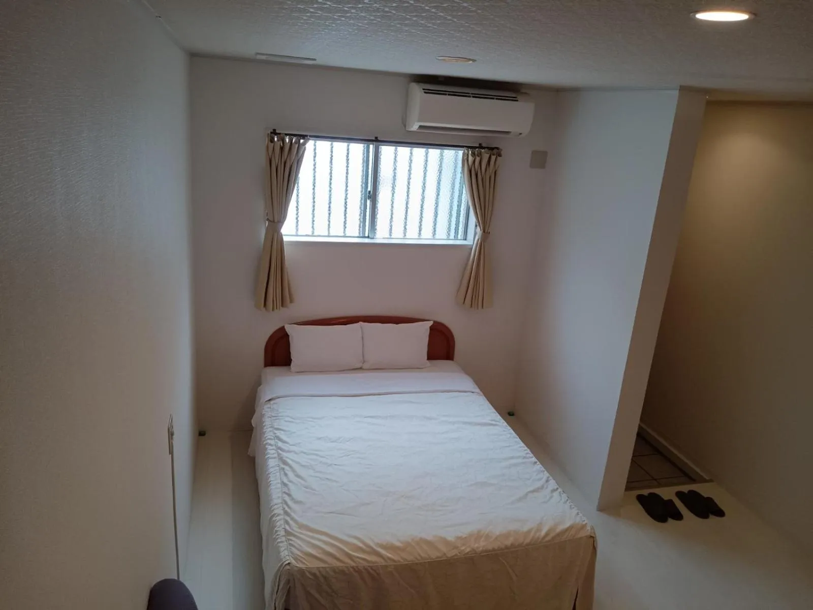 Bed in Hotel Palm Tree Hill