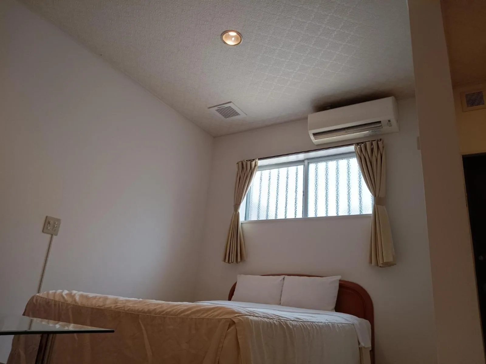 Bed in Hotel Palm Tree Hill