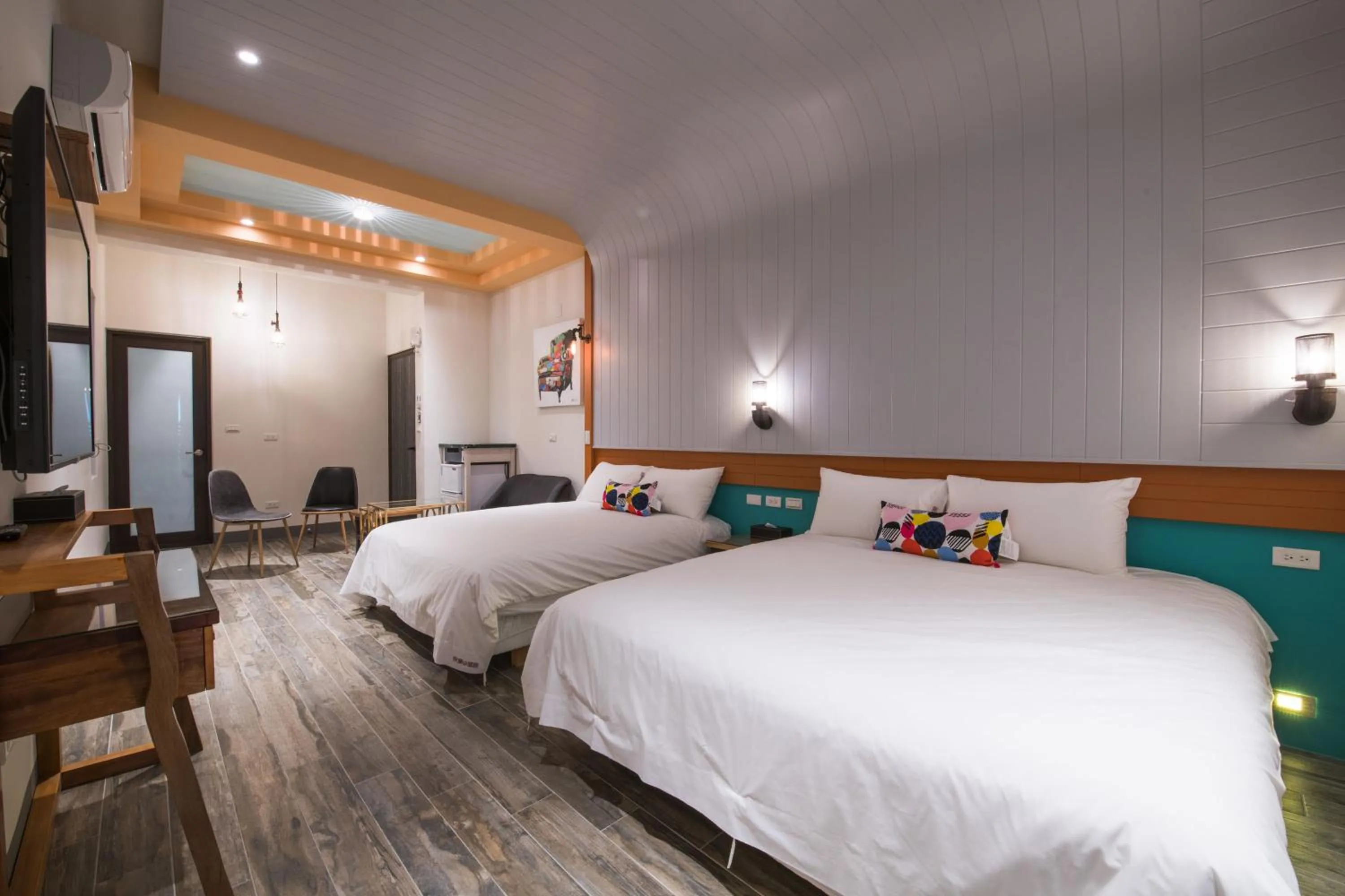 Bed in Happy Wing Guesthouse