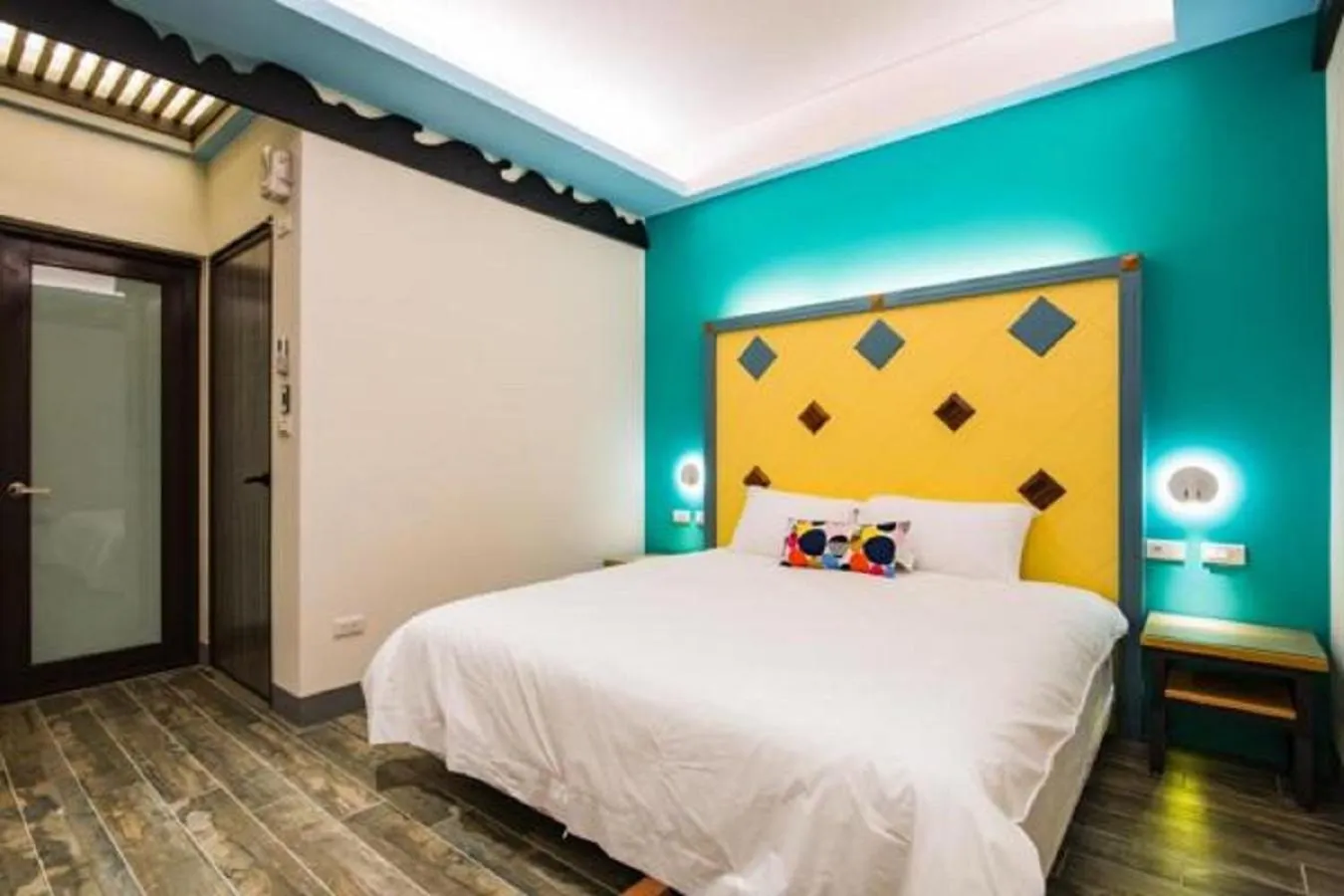 Bed in Happy Wing Guesthouse