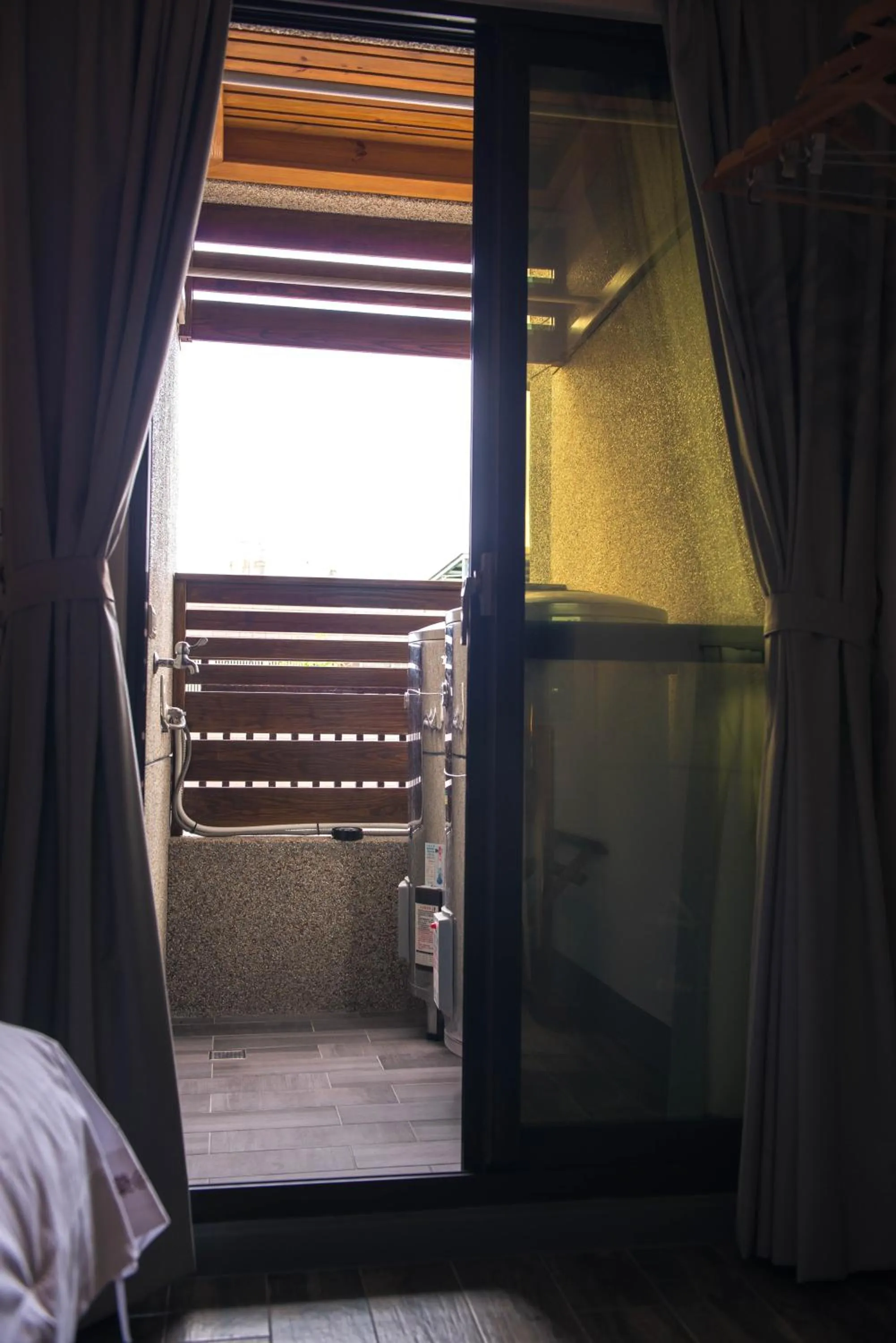 Bed in Happy Wing Guesthouse