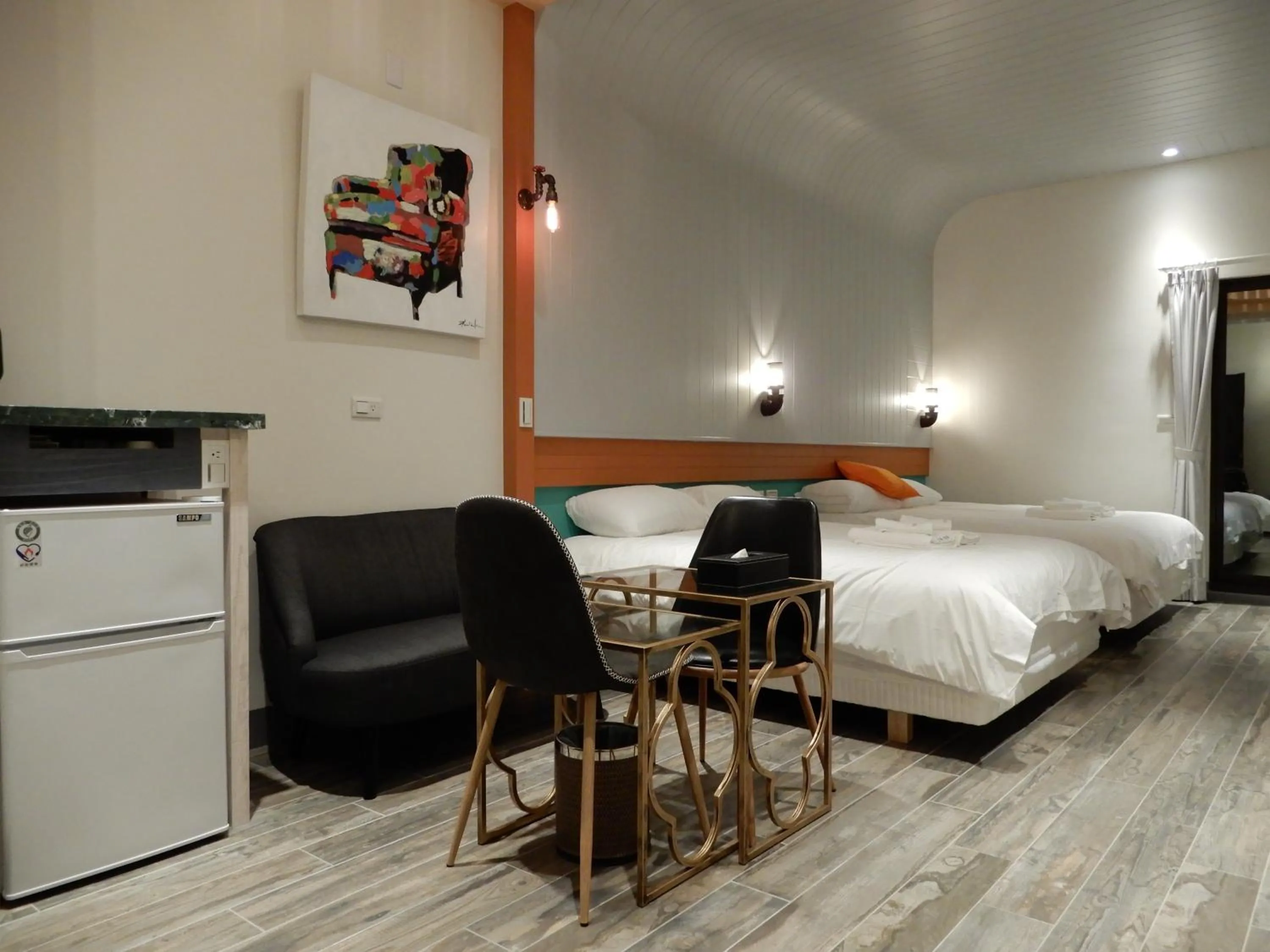 Bed in Happy Wing Guesthouse