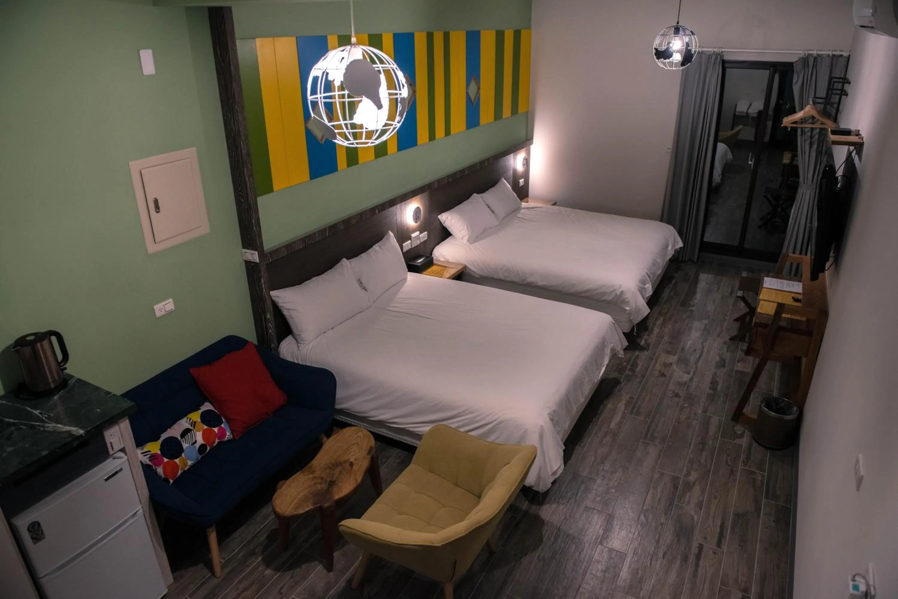 Bed in Happy Wing Guesthouse