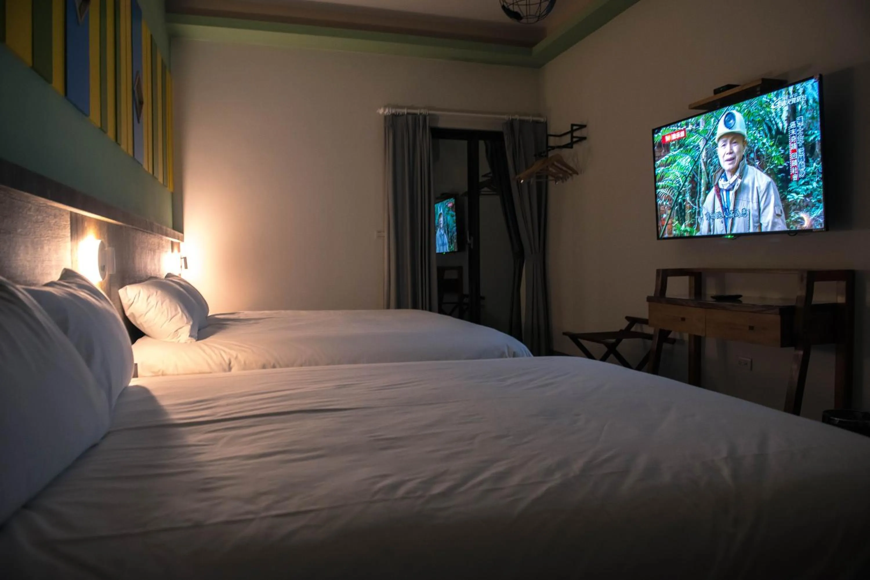 Bed in Happy Wing Guesthouse