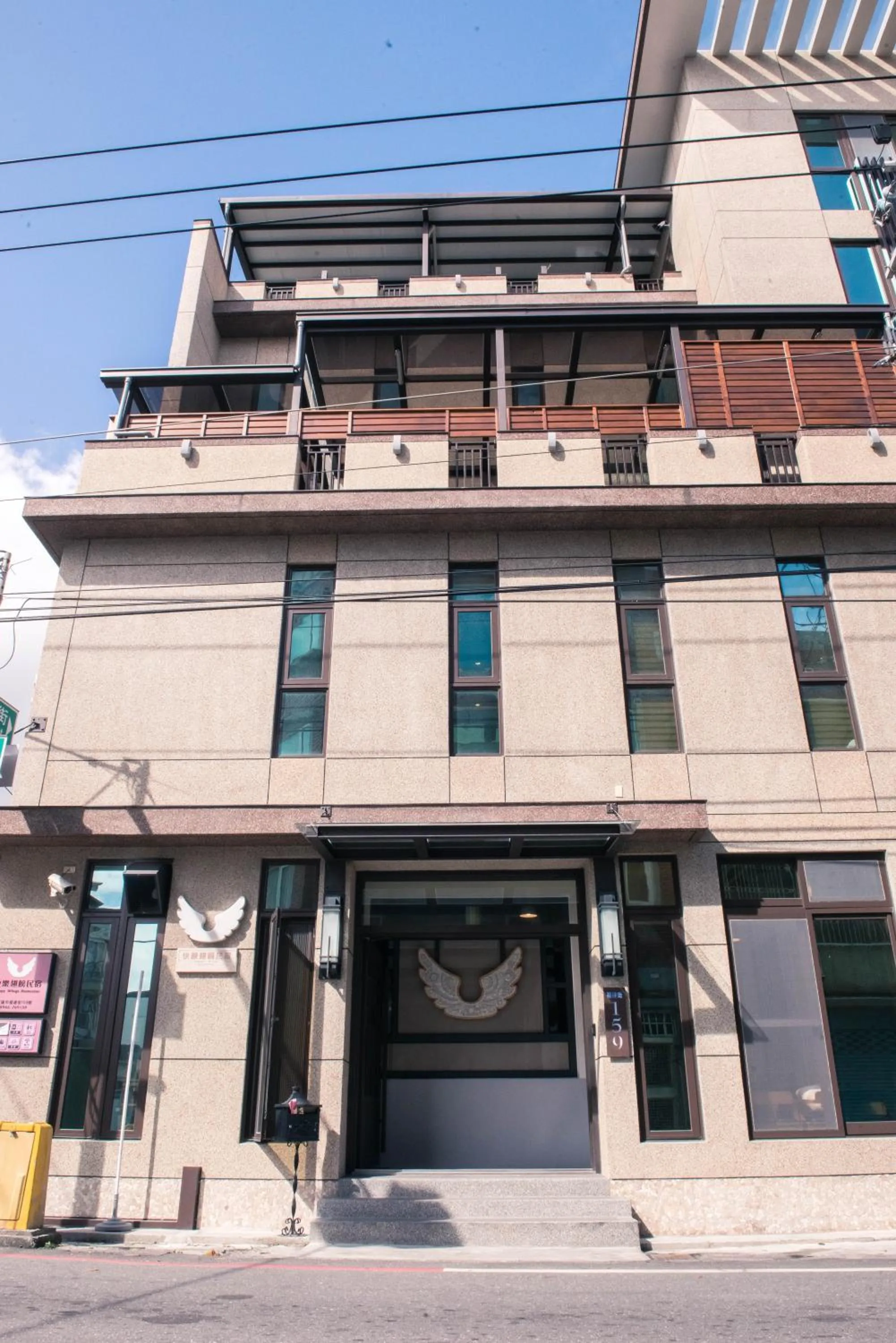 Property building in Happy Wing Guesthouse