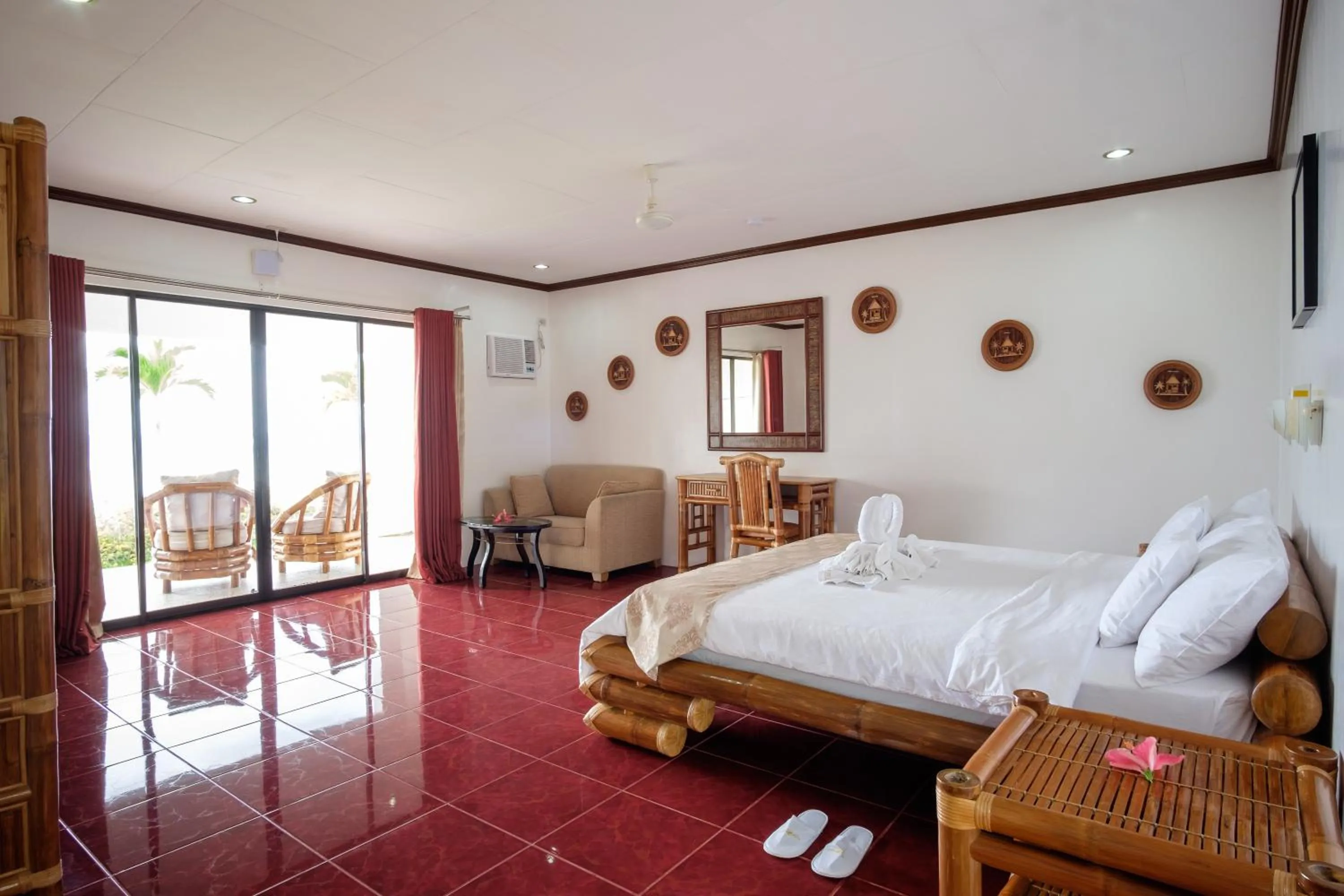 Bed in Kasai Village Dive Resort