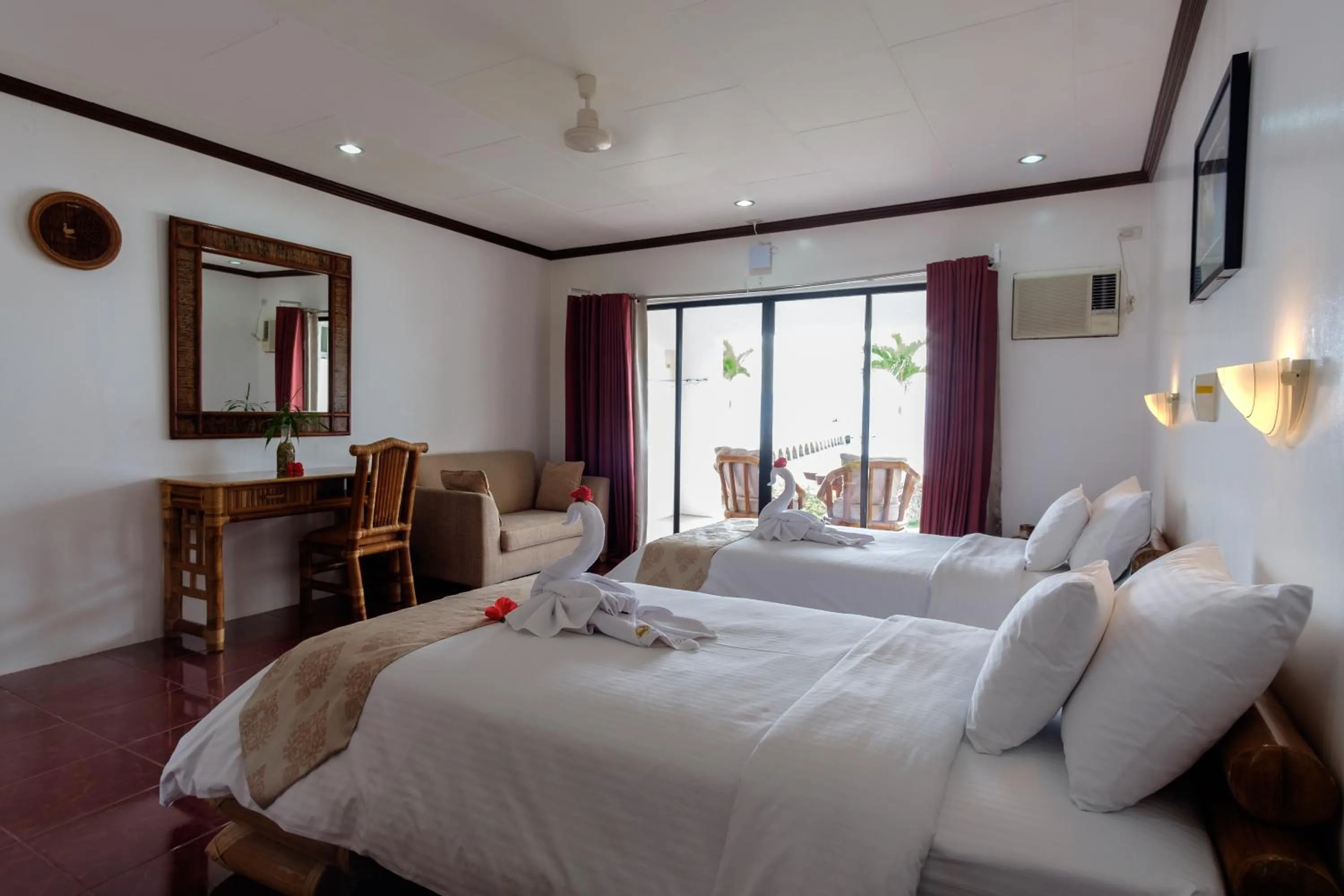 Bed in Kasai Village Dive Resort