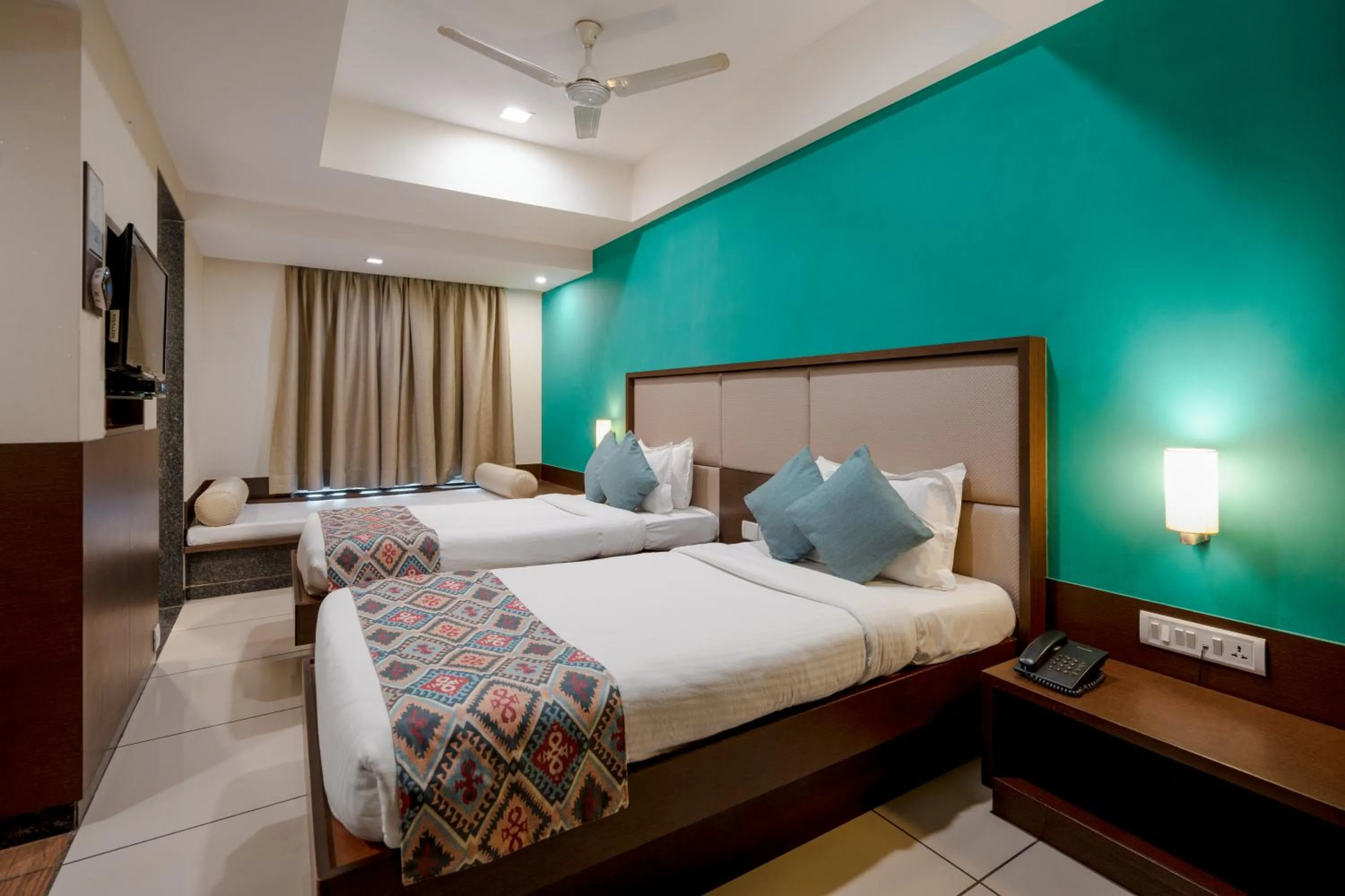 Bed in GCC Hotel and Club