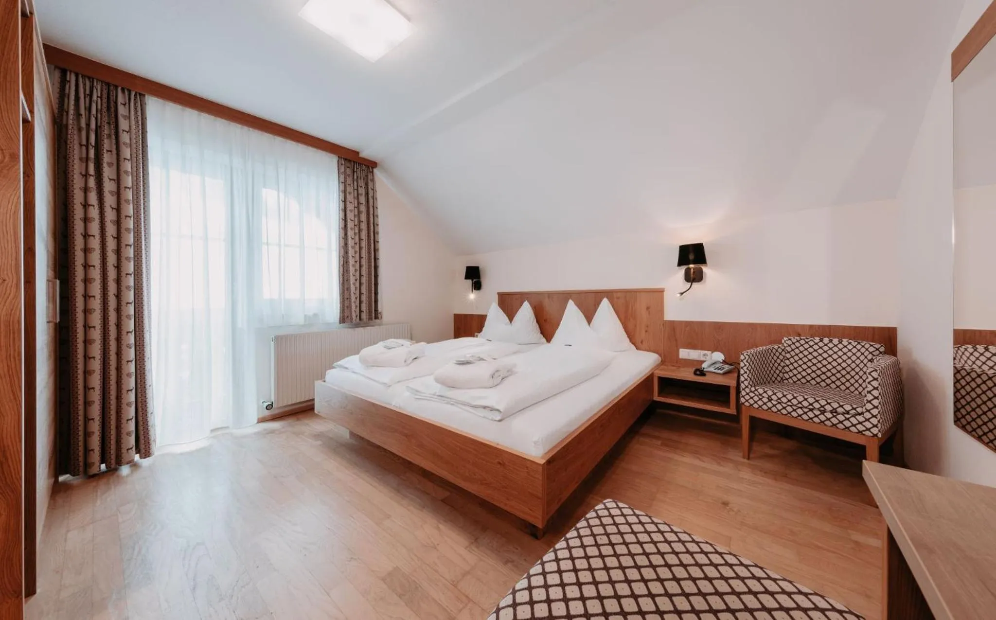 Photo of the whole room, Bed in Hotel Schröckerhof