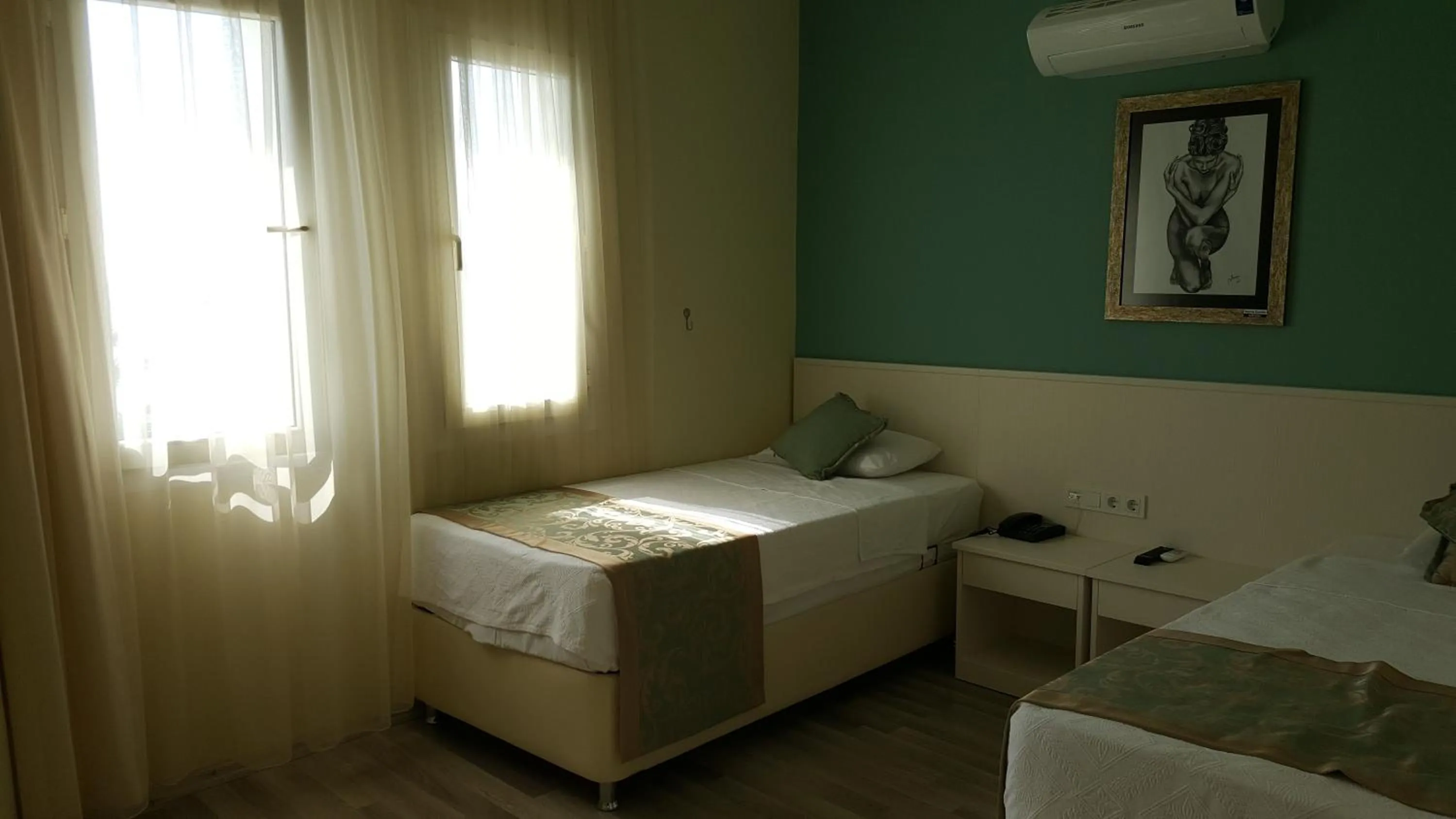 Bed in Artemis Hotel