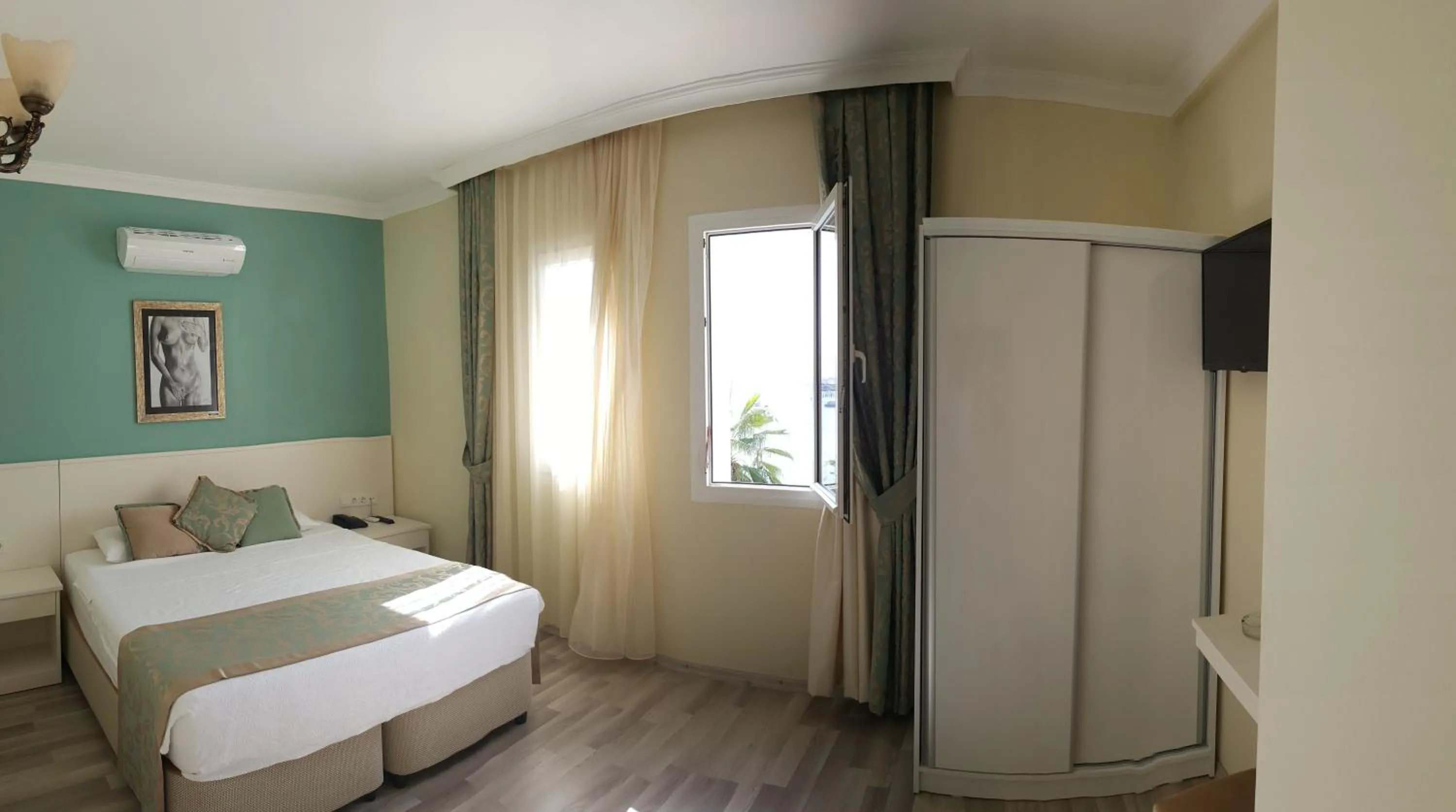 Bed in Artemis Hotel