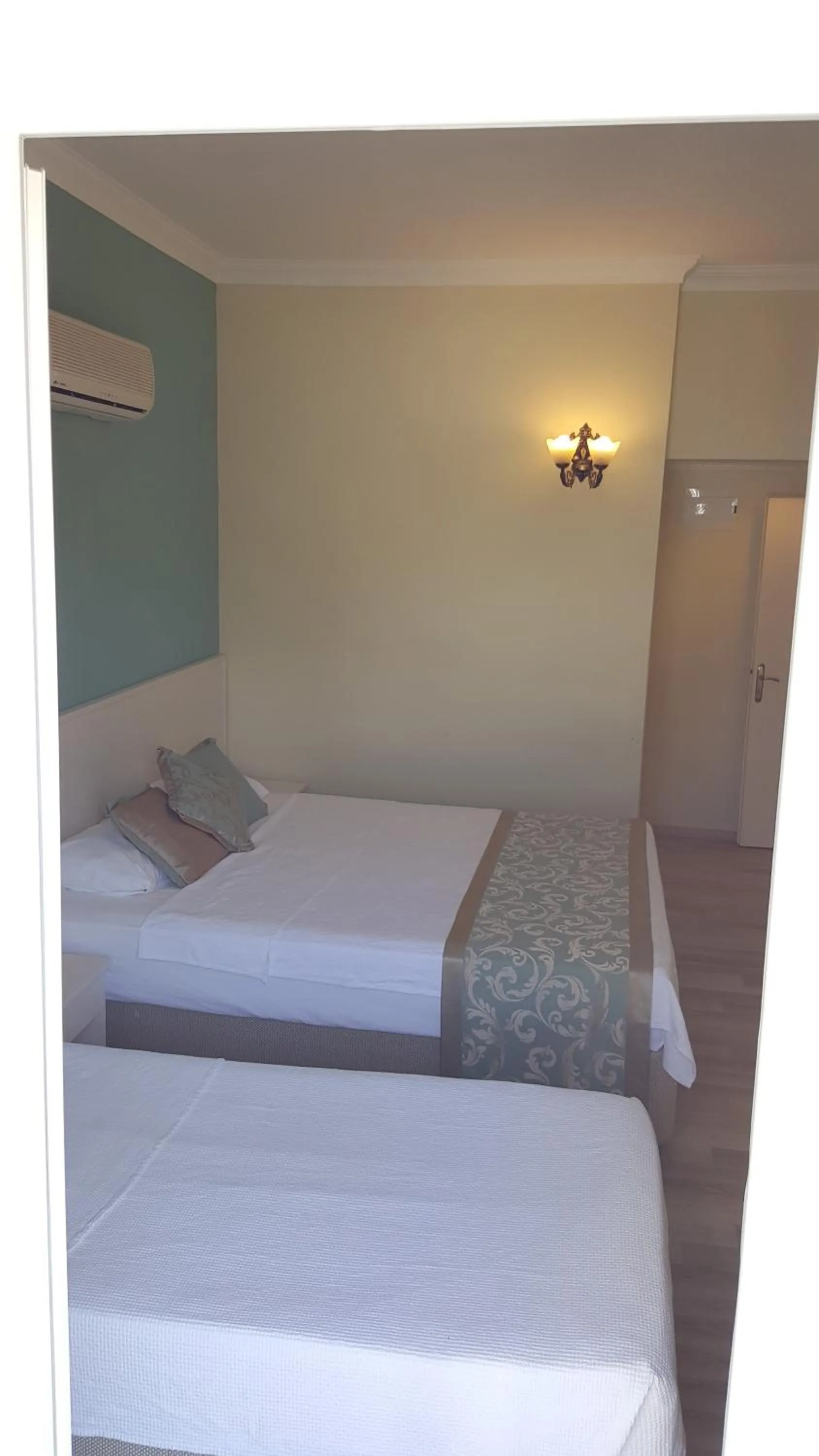 Bed in Artemis Hotel