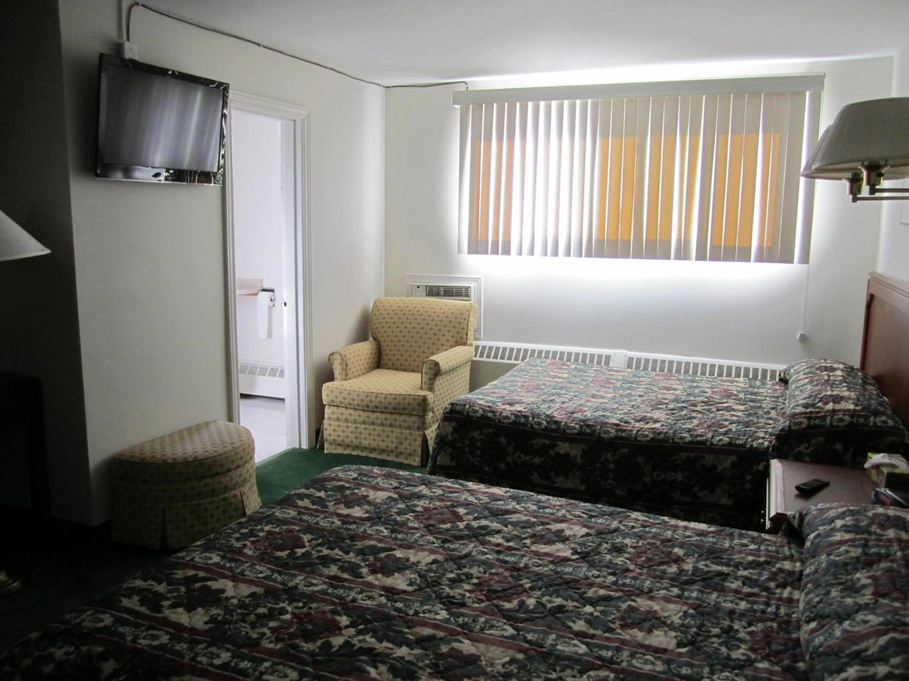 Bed in Canadiana Motel