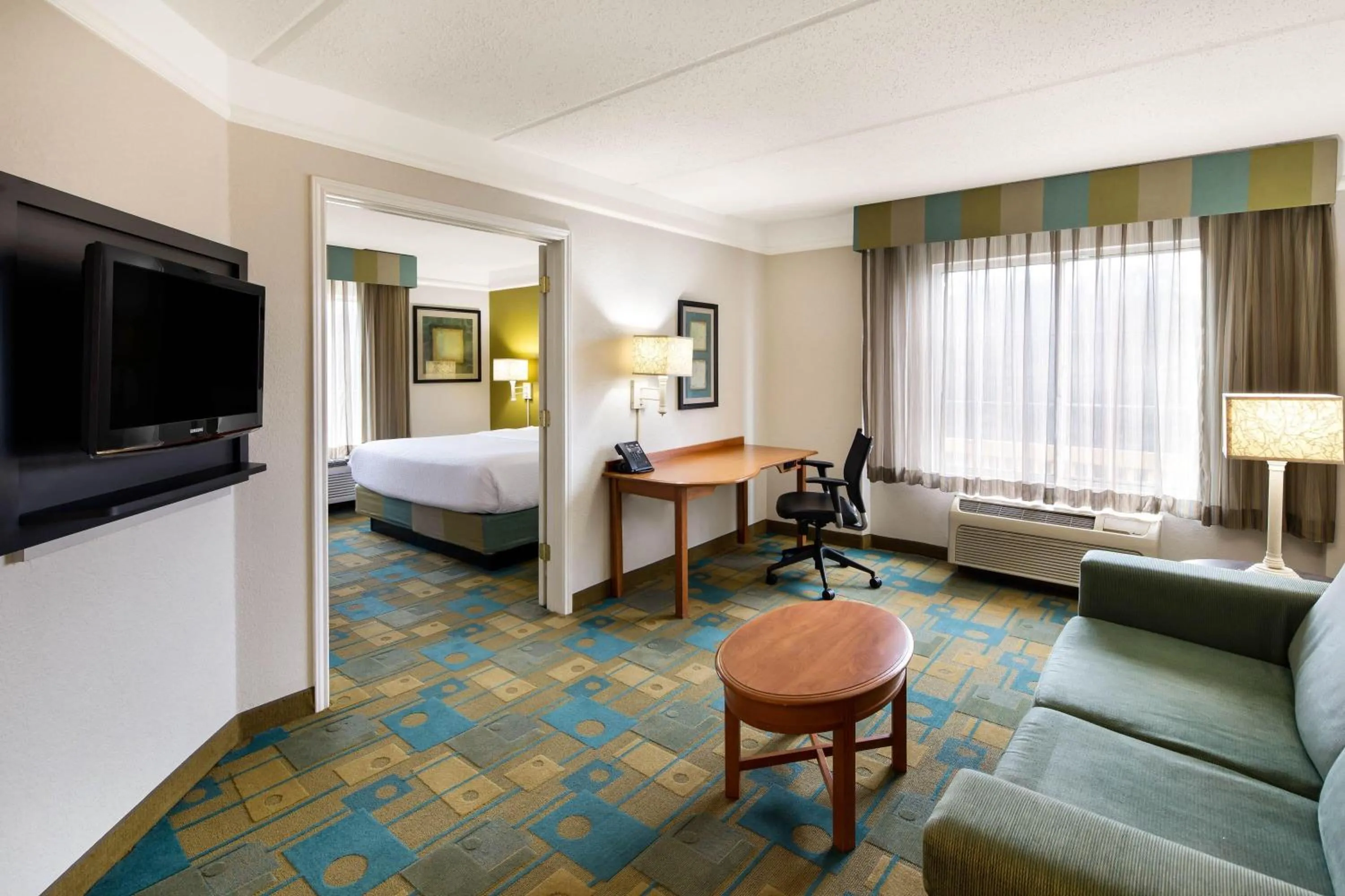 Photo of the whole room, Bed in La Quinta by Wyndham Haywood Mall-Near Greenville Downtown